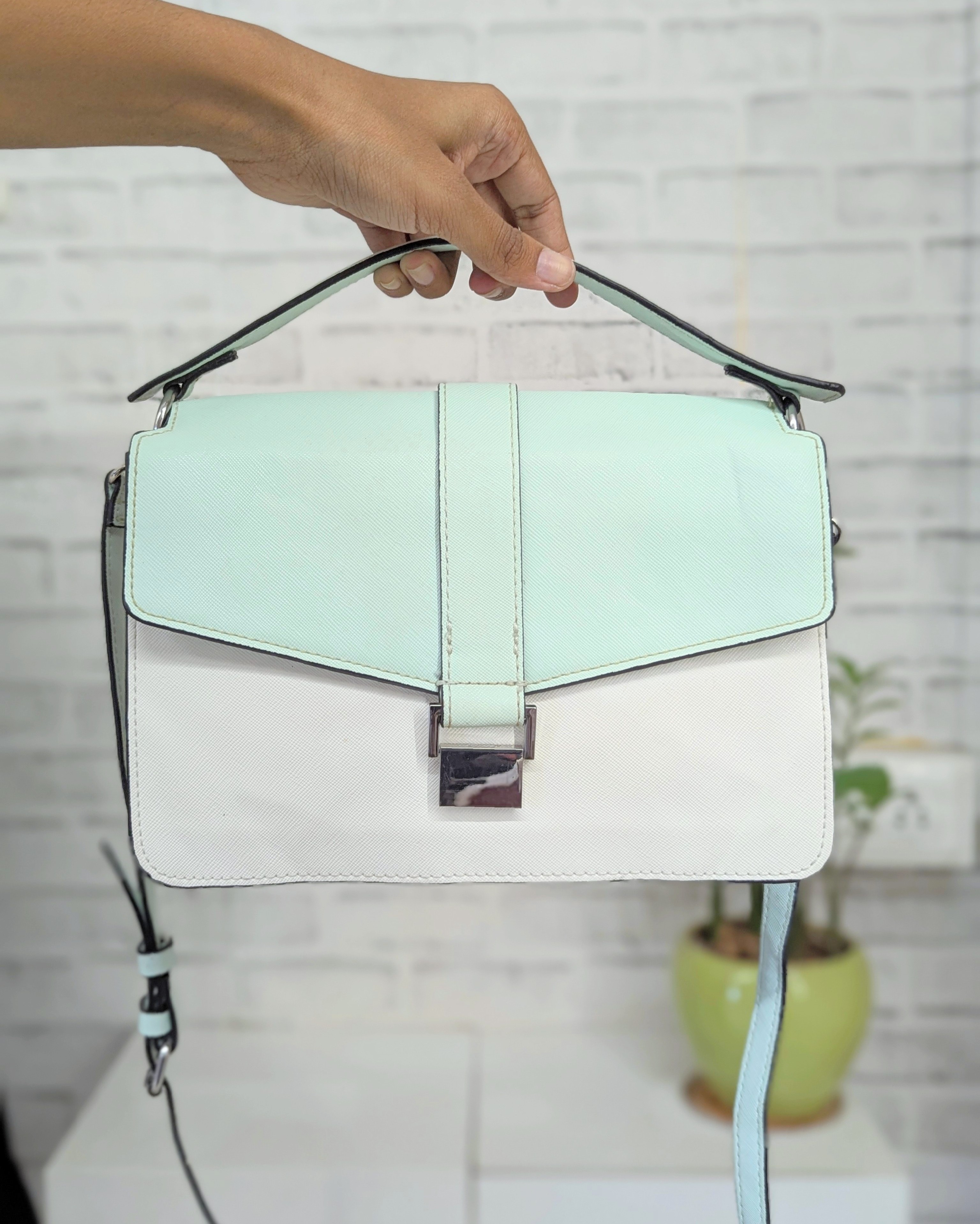 Mint green and white colorblock bag