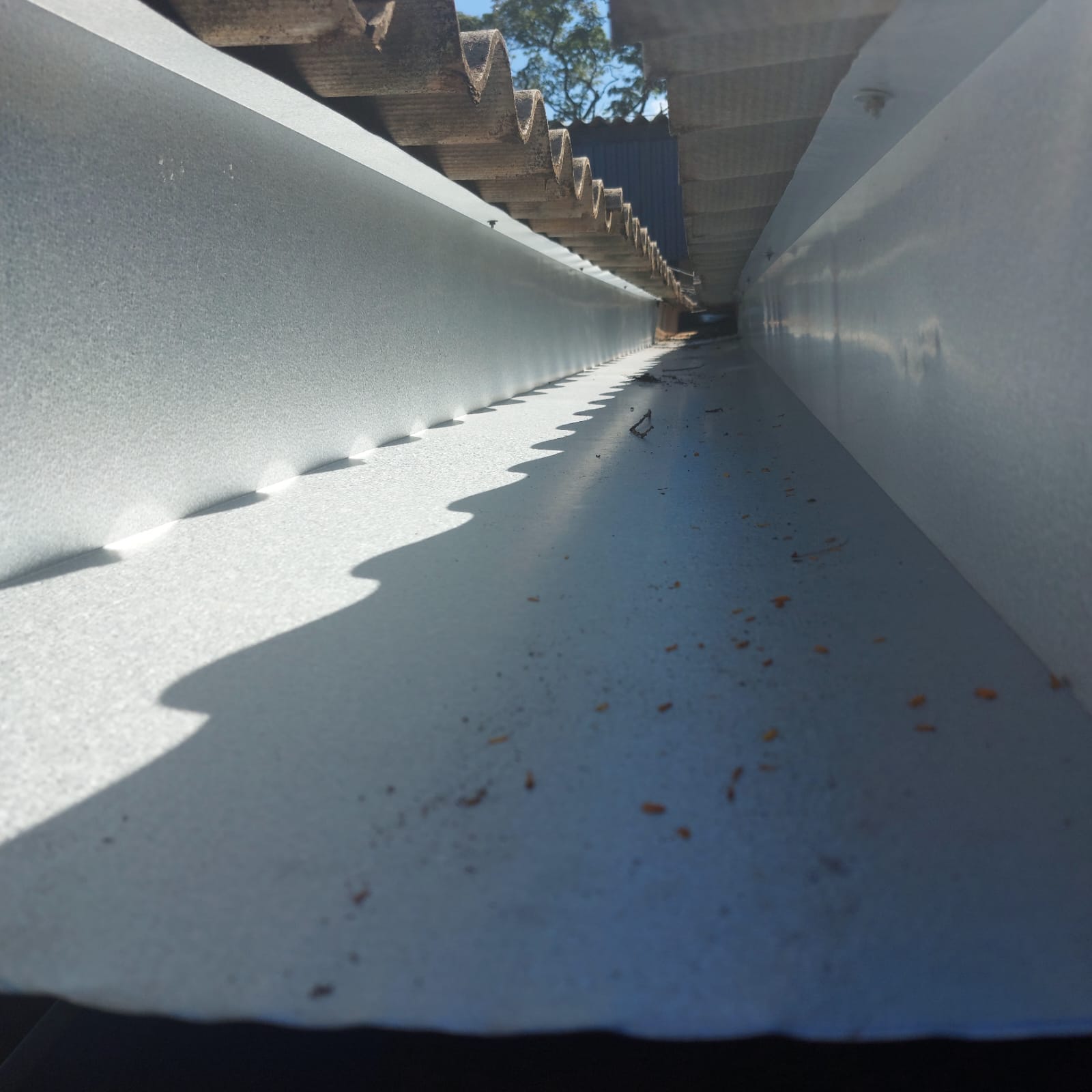 Prolongamento de calha coxo, duas águas