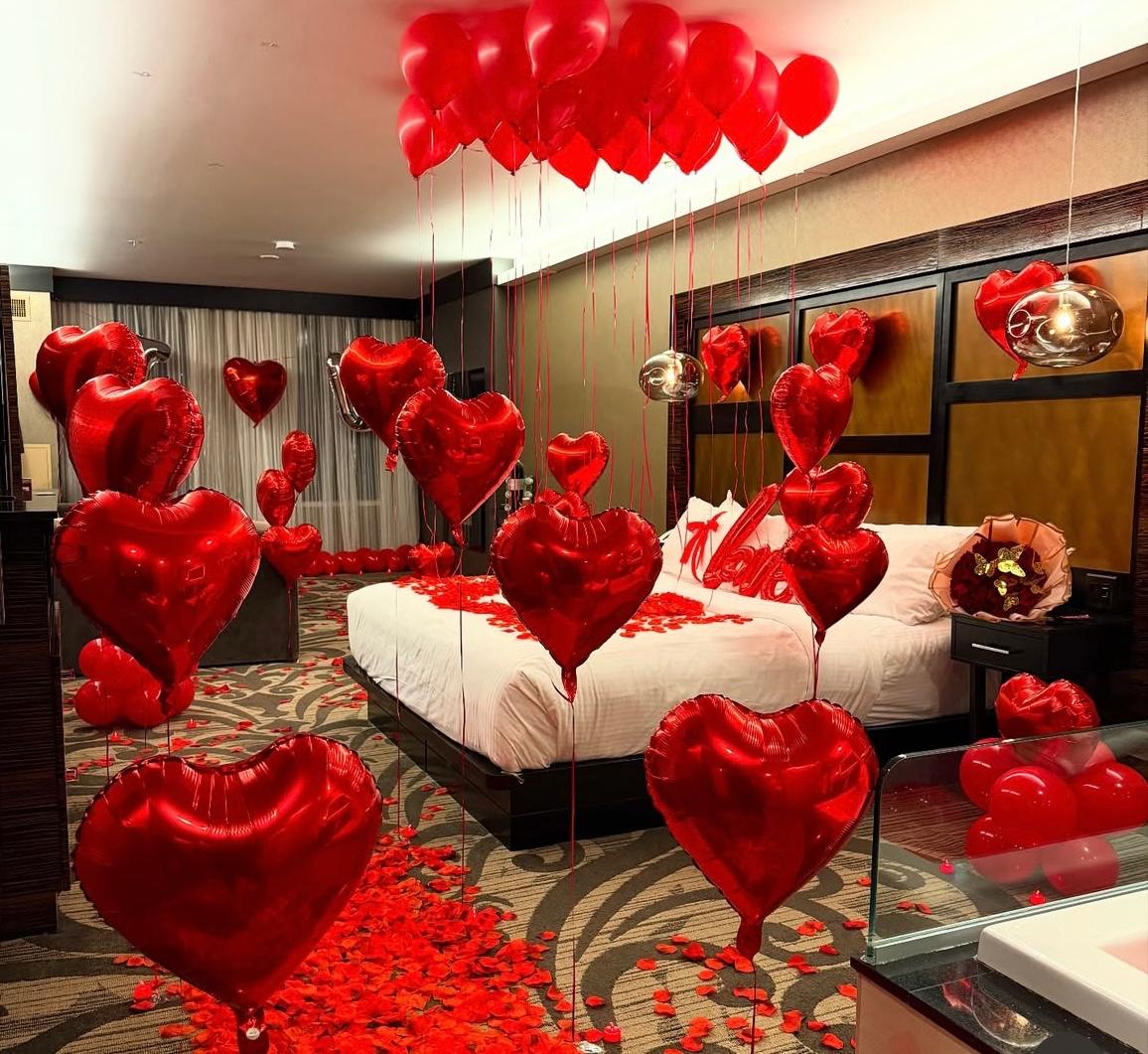 Romantic Bedroom Setup with Balloons