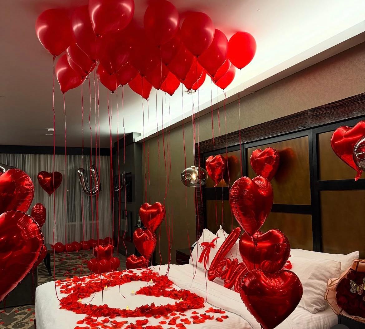 Romantic Bedroom Setup with Balloons