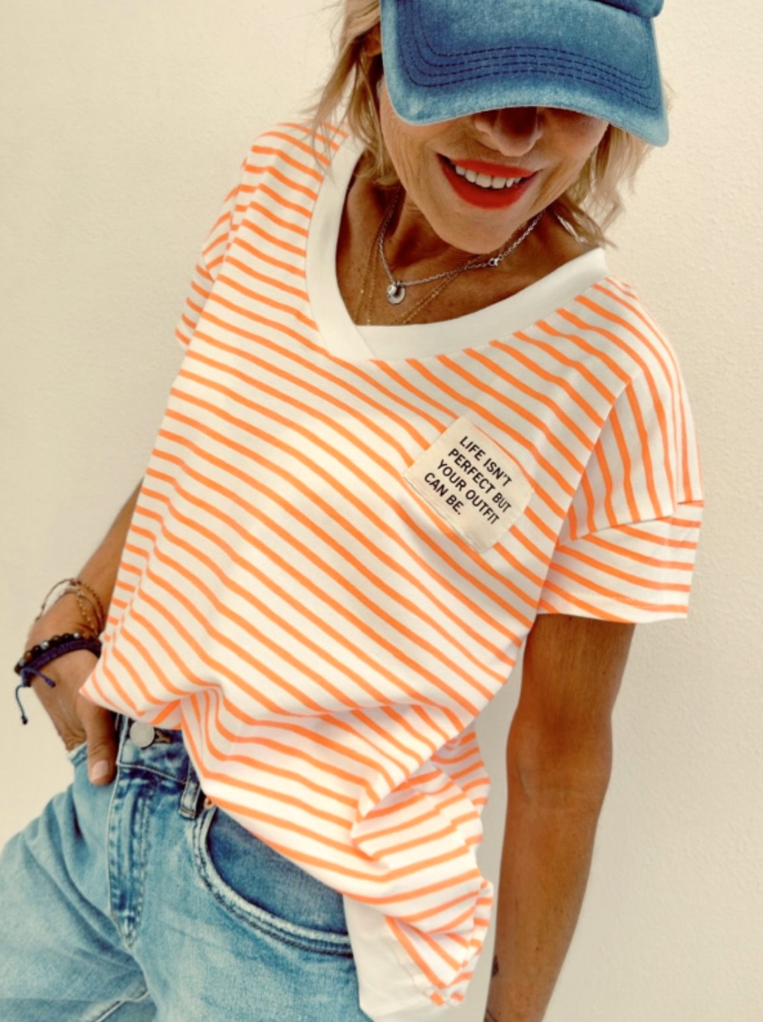 T-shirt rayé orange et blanc
