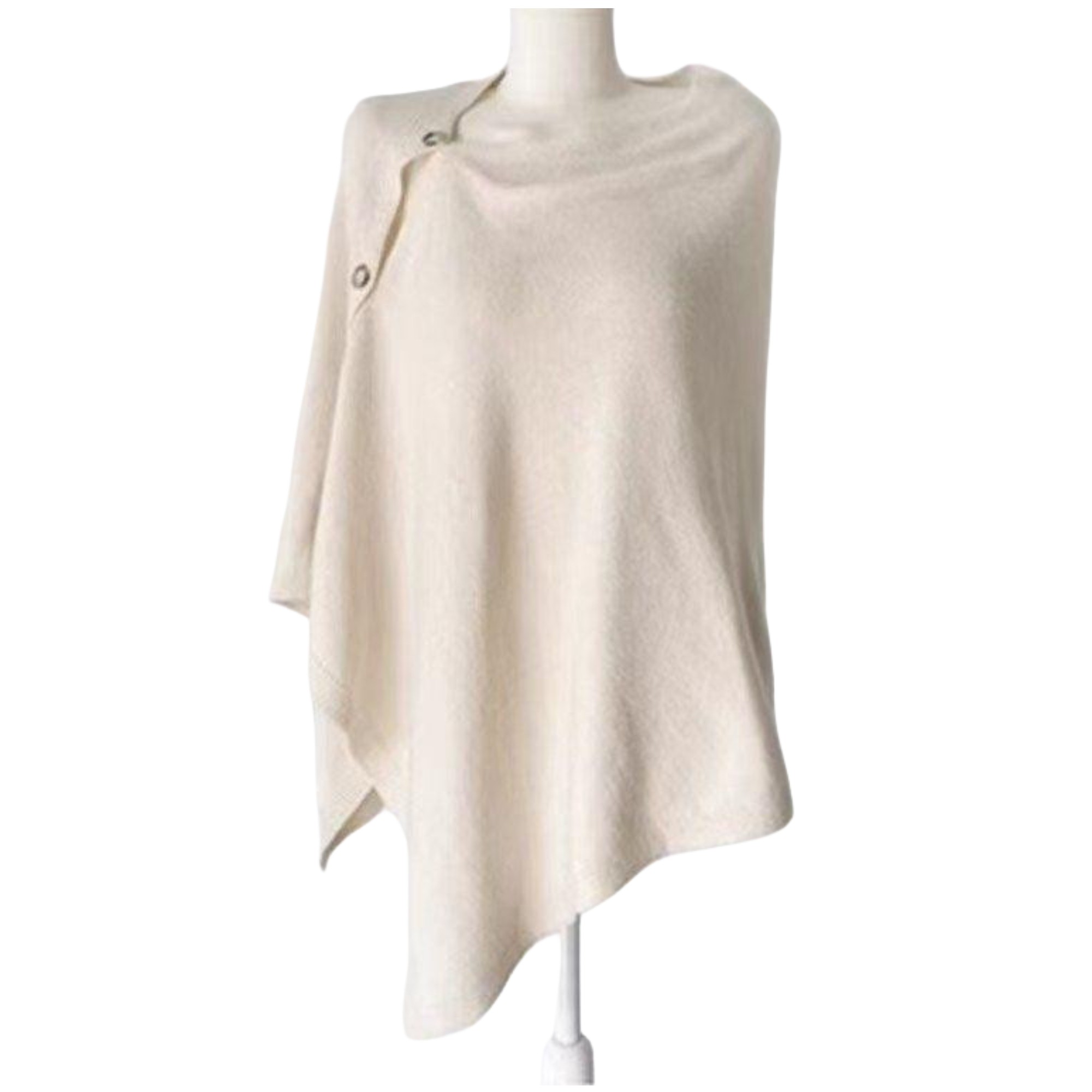 Lightweight Button Detail Cape in Cream. Offering a touch of luxury and warmth wherever you go.