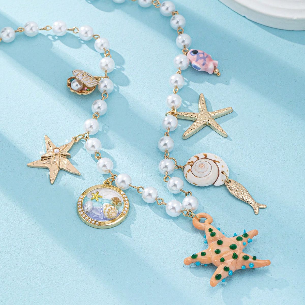 Starfish and Mermaid Dreams Necklace in Orange 