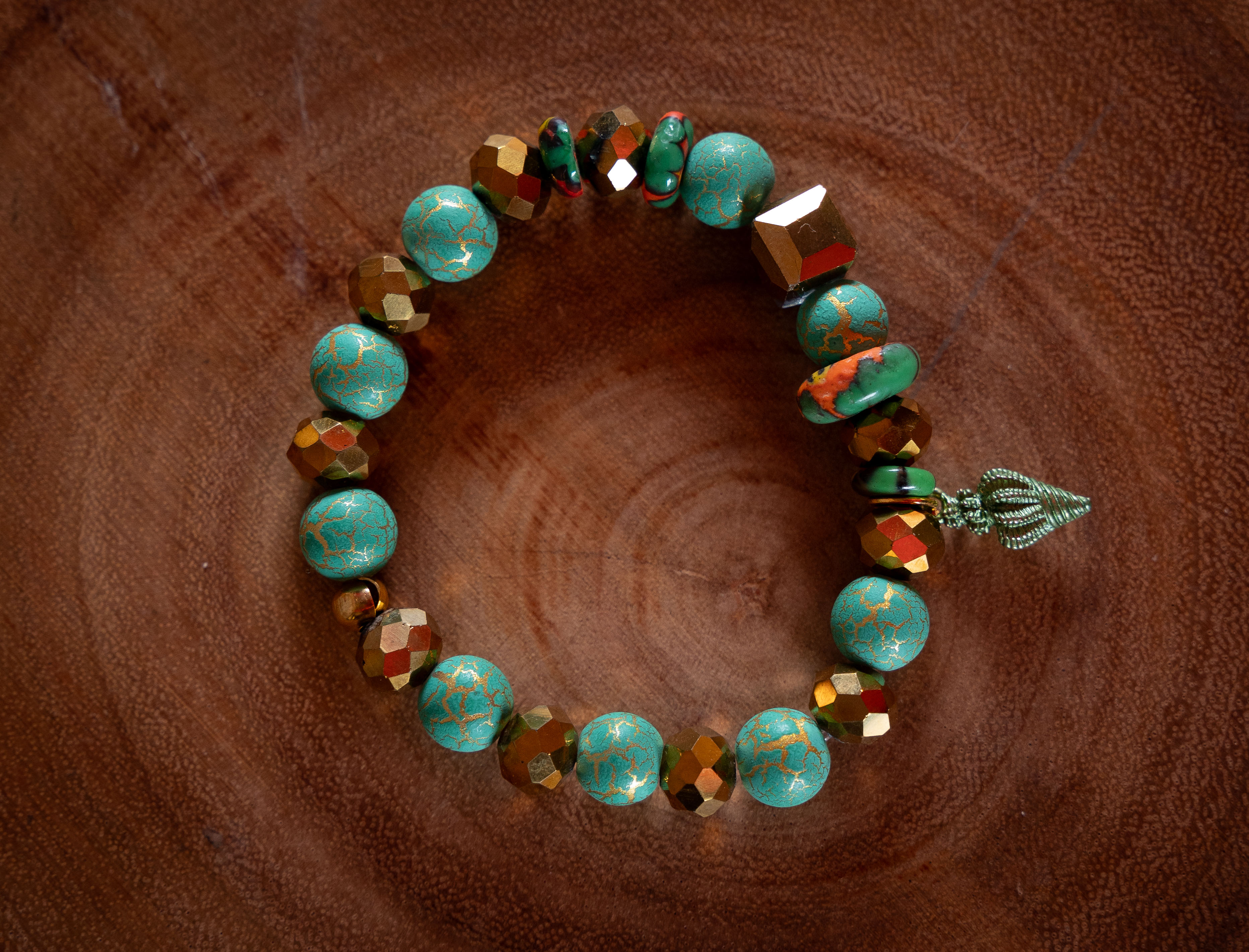 Green and Gold Beaded Bracelet with Shell Charm
