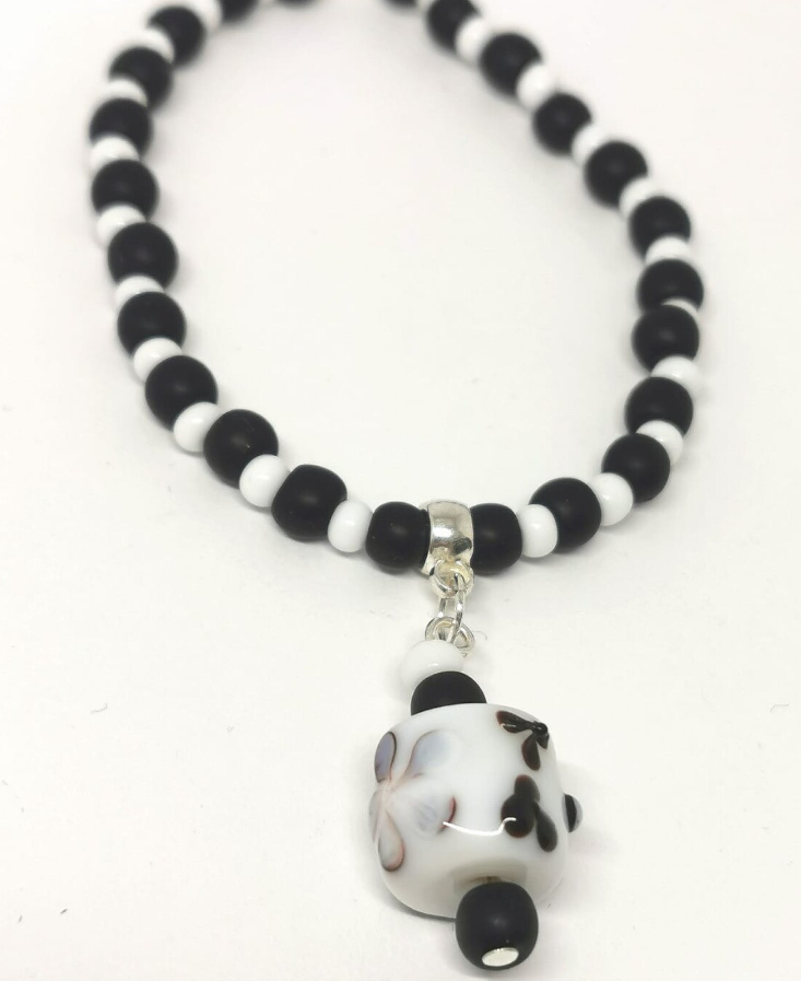 Black and White Dangling Charm Glass Lamp Work Bracelet