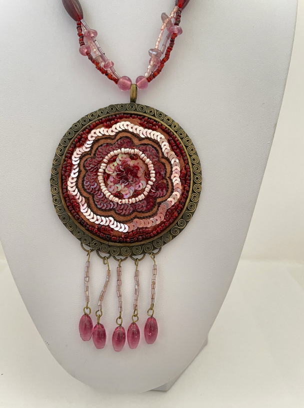 Long Beaded Multi Strand Sequin and Tassel Large Brass Pendant Pink and Red Necklace