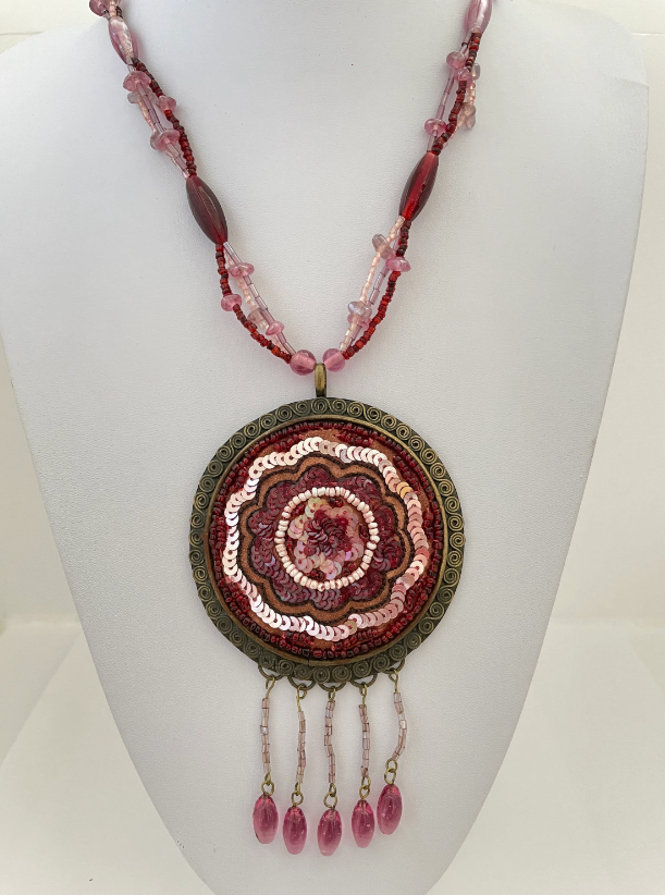 Long Beaded Multi Strand Sequin and Tassel Large Brass Pendant Pink and Red Necklace