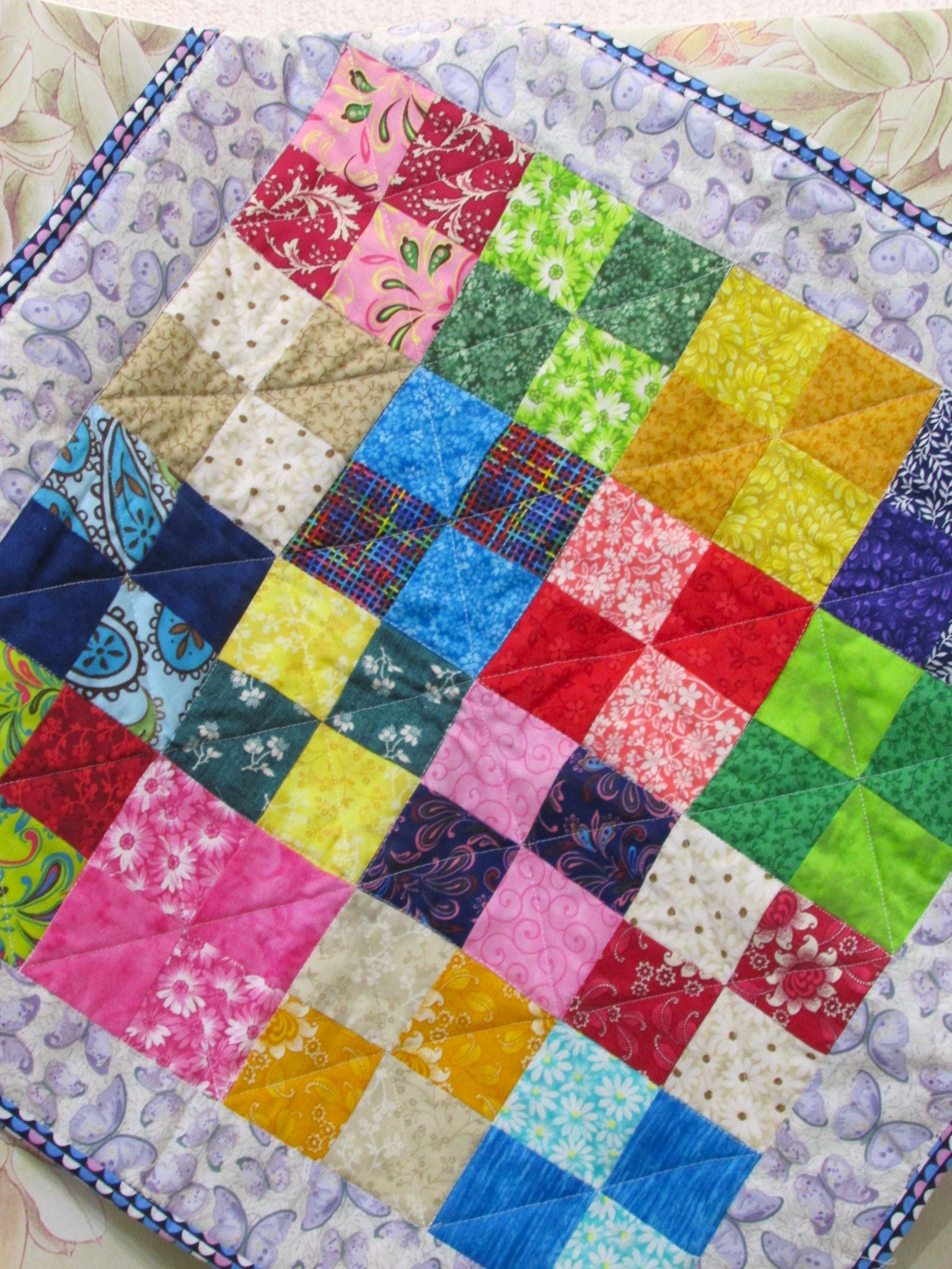 973   Doll-sized 4 Patch Quilt