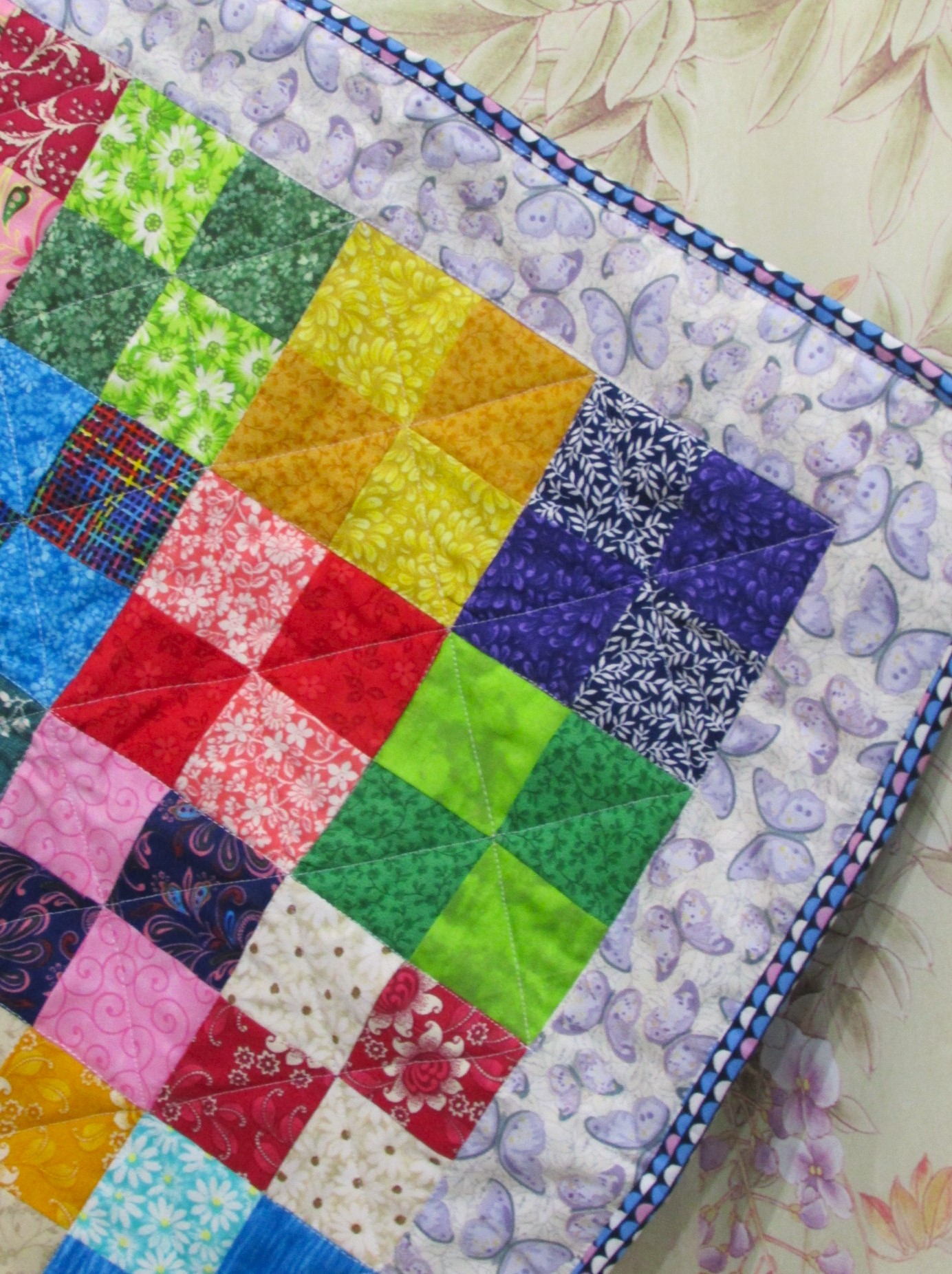 973   Doll-sized 4 Patch Quilt