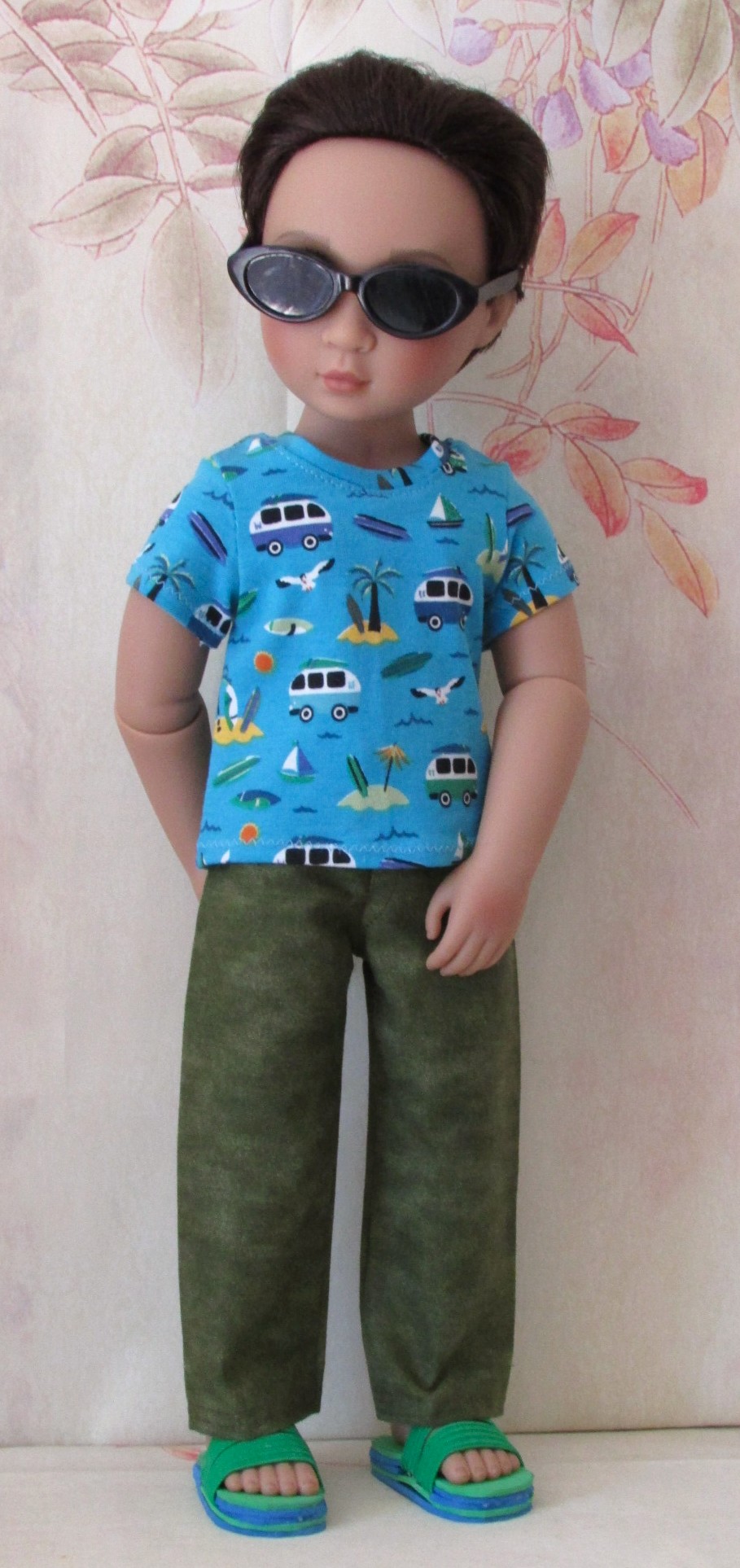 881   Surfing Tee-Shirt, Olive Green Jeans, Green & Blue Sliders, Black Sunglasses
