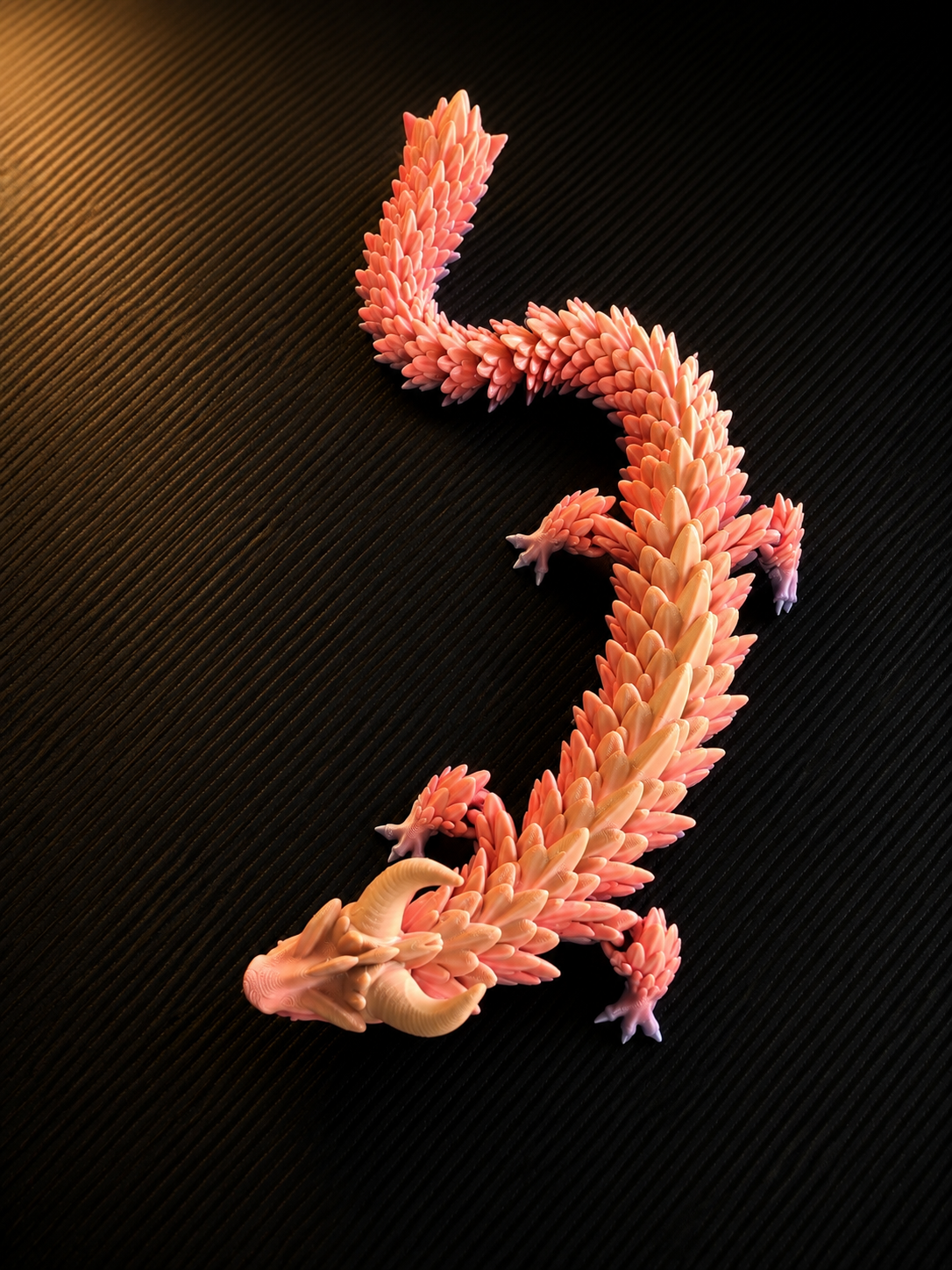 Dragon articulé multicolore