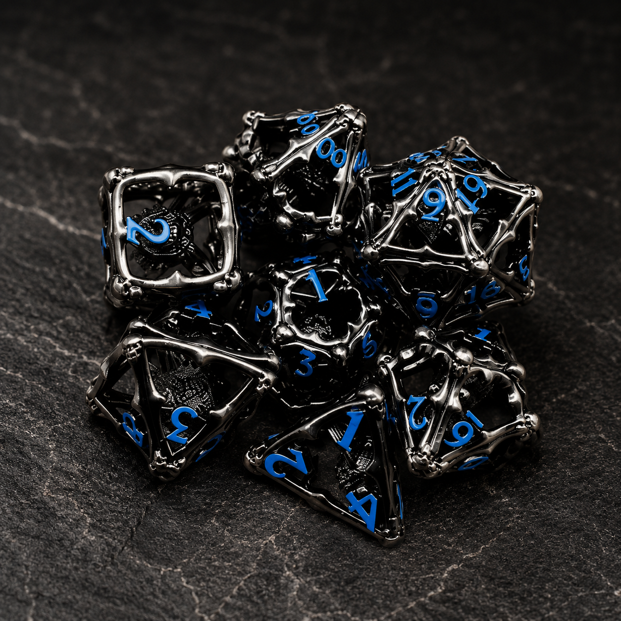 Set de dés métalliques pour jeux de rôle, Tyranoeil noir et bleu