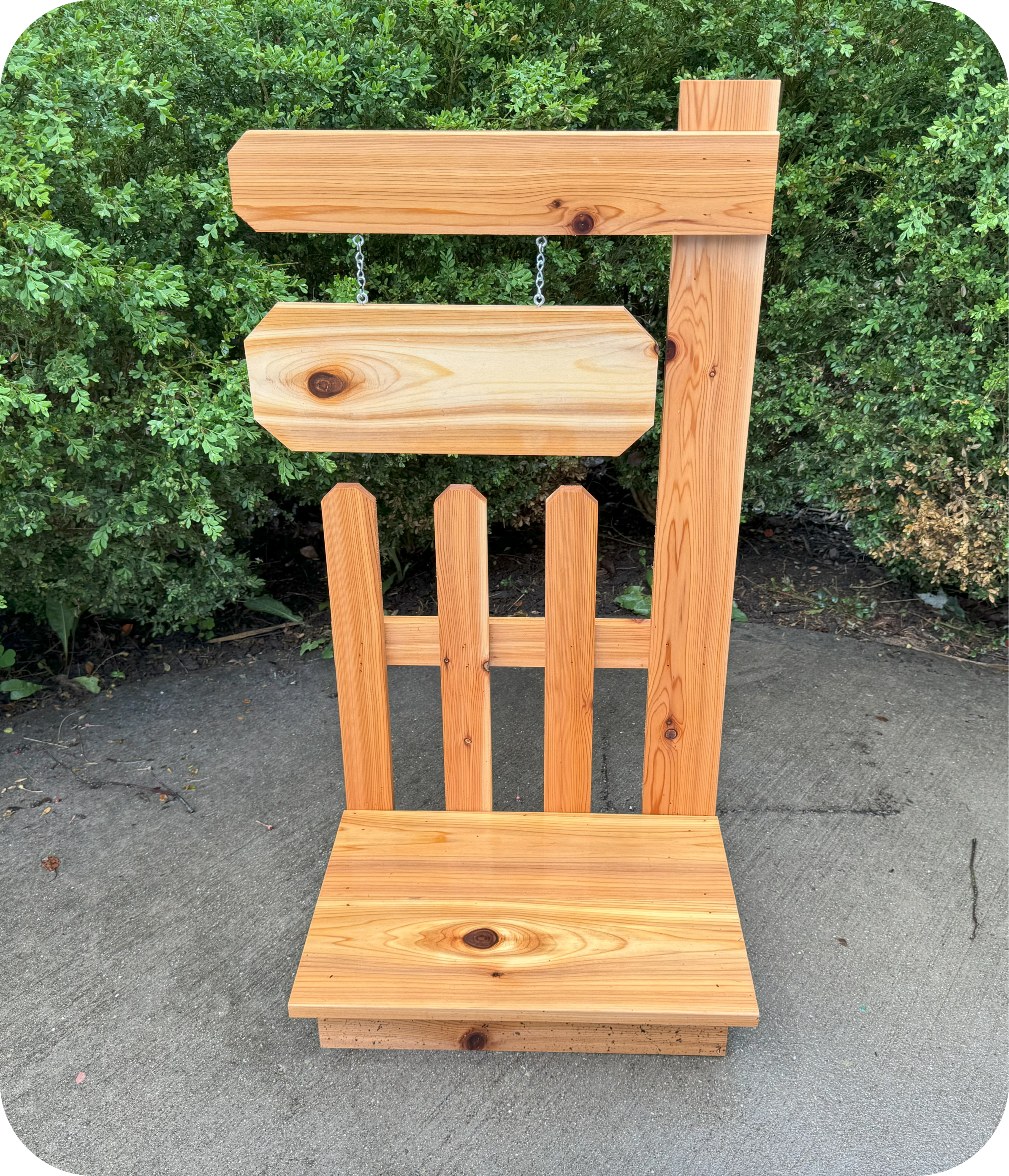 Picket fence hanging welcome sign with planter stand