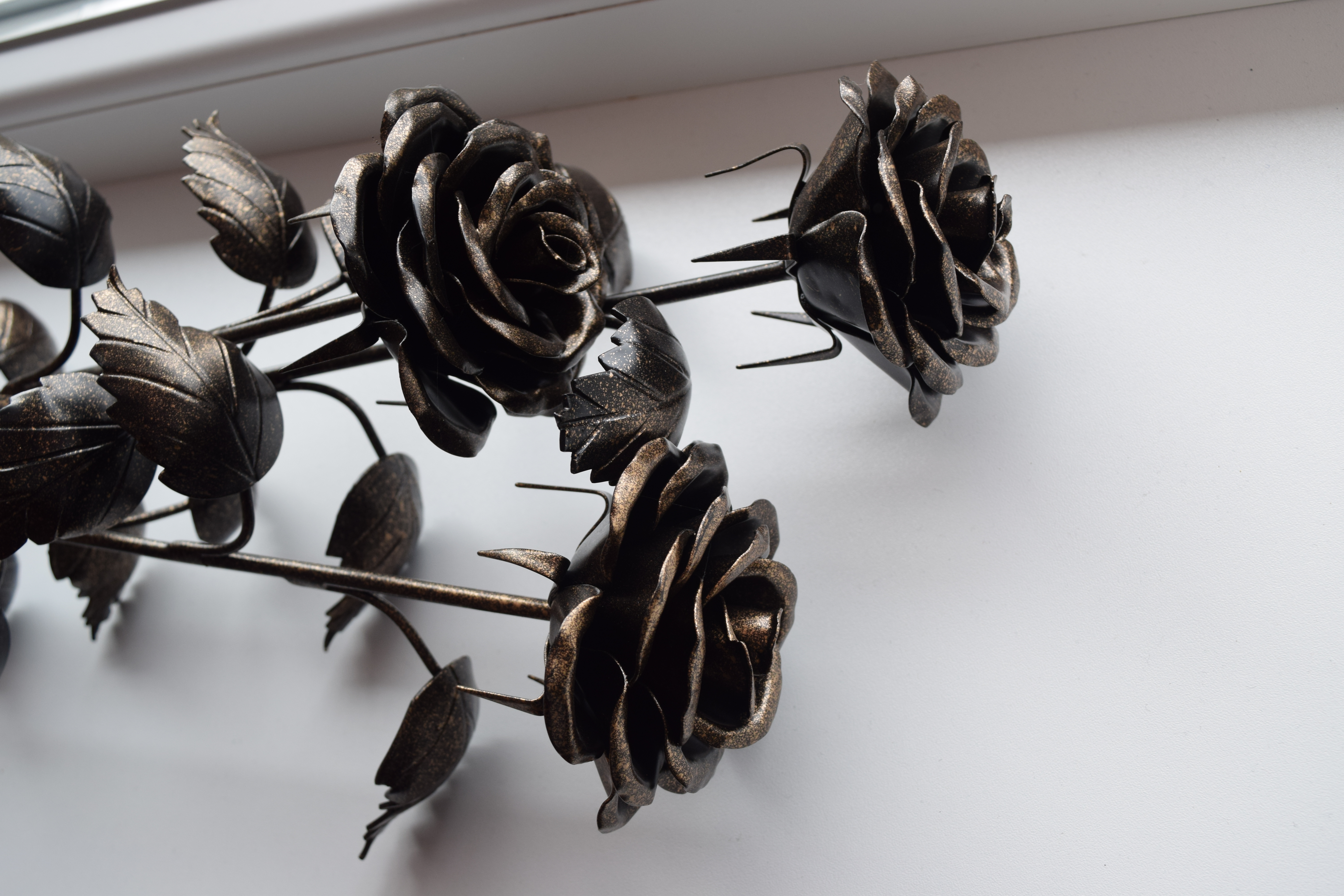 Rankų darbo kalviškos rožės