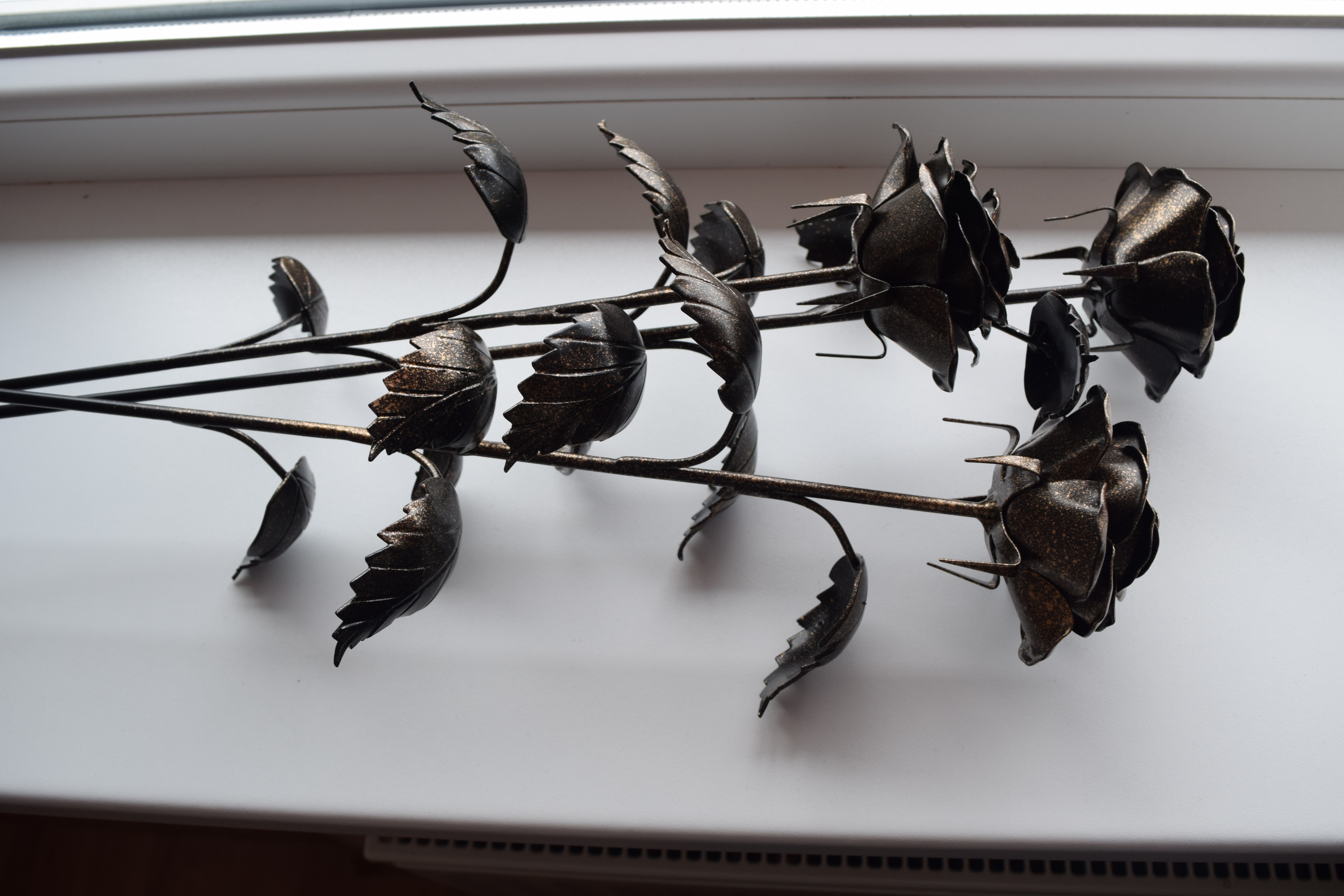 Rankų darbo kalviškos rožės