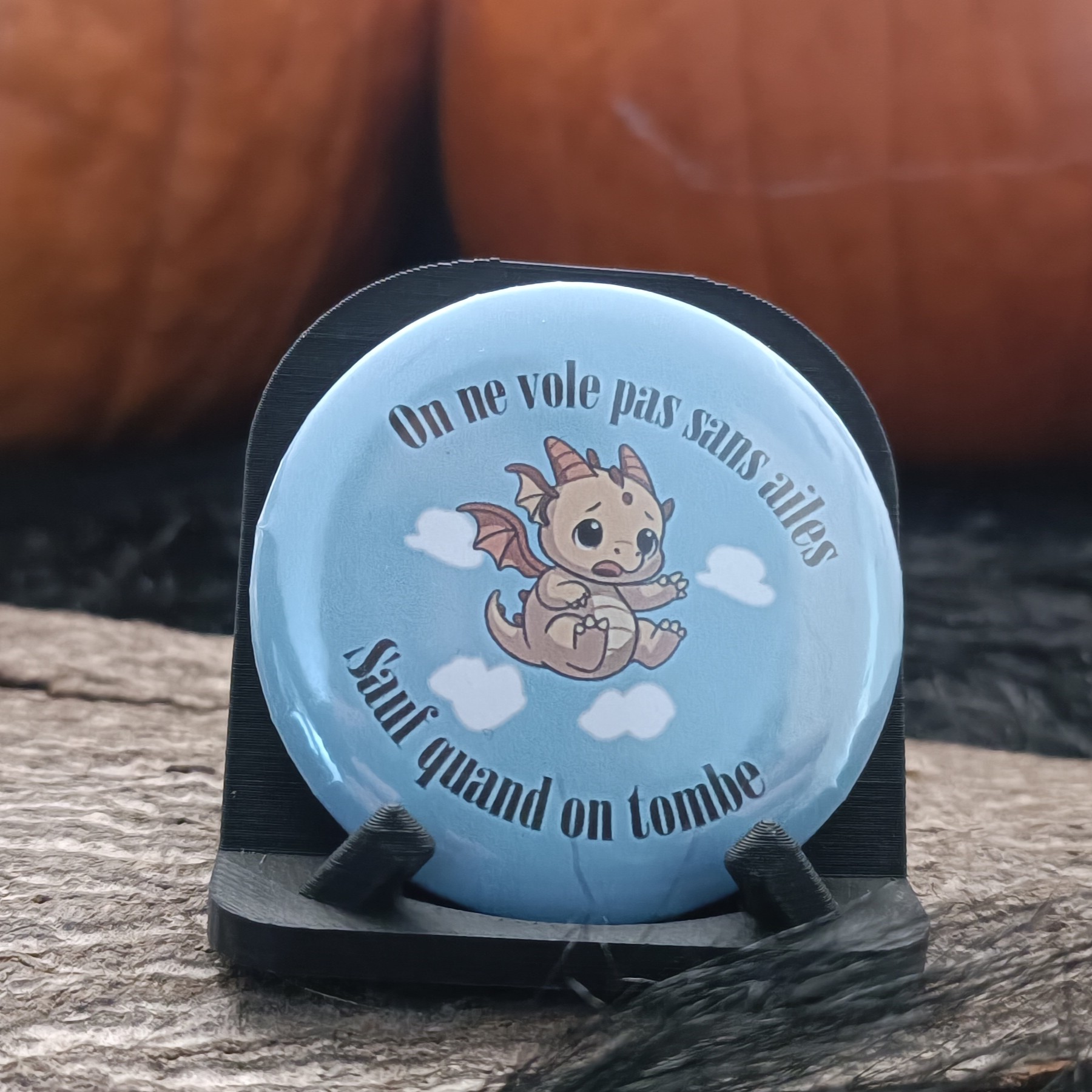 Badge "On ne vole pas sans ailes sauf quand on tombe"