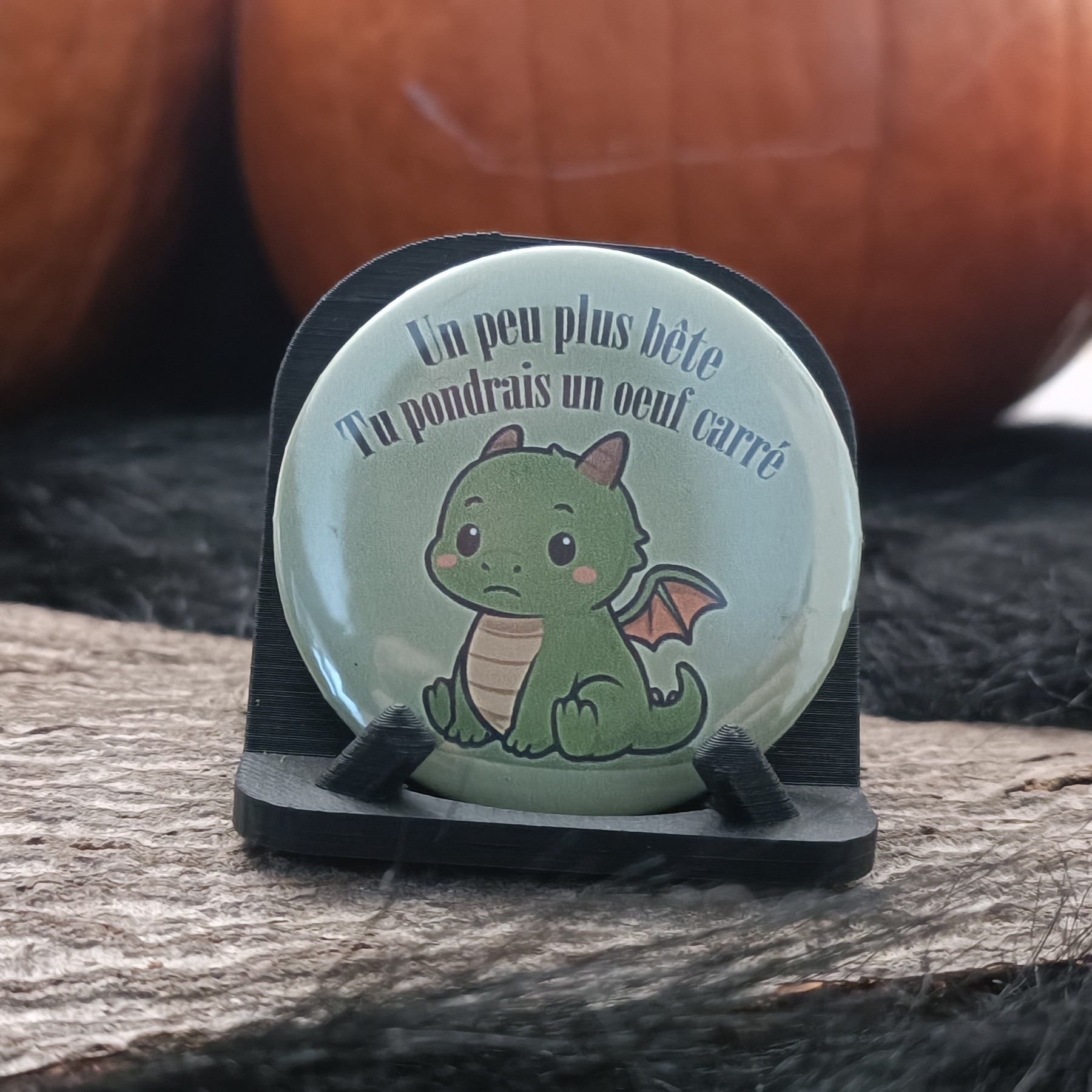 Badge "Un peu plus bête tu pondrais un oeuf carré"