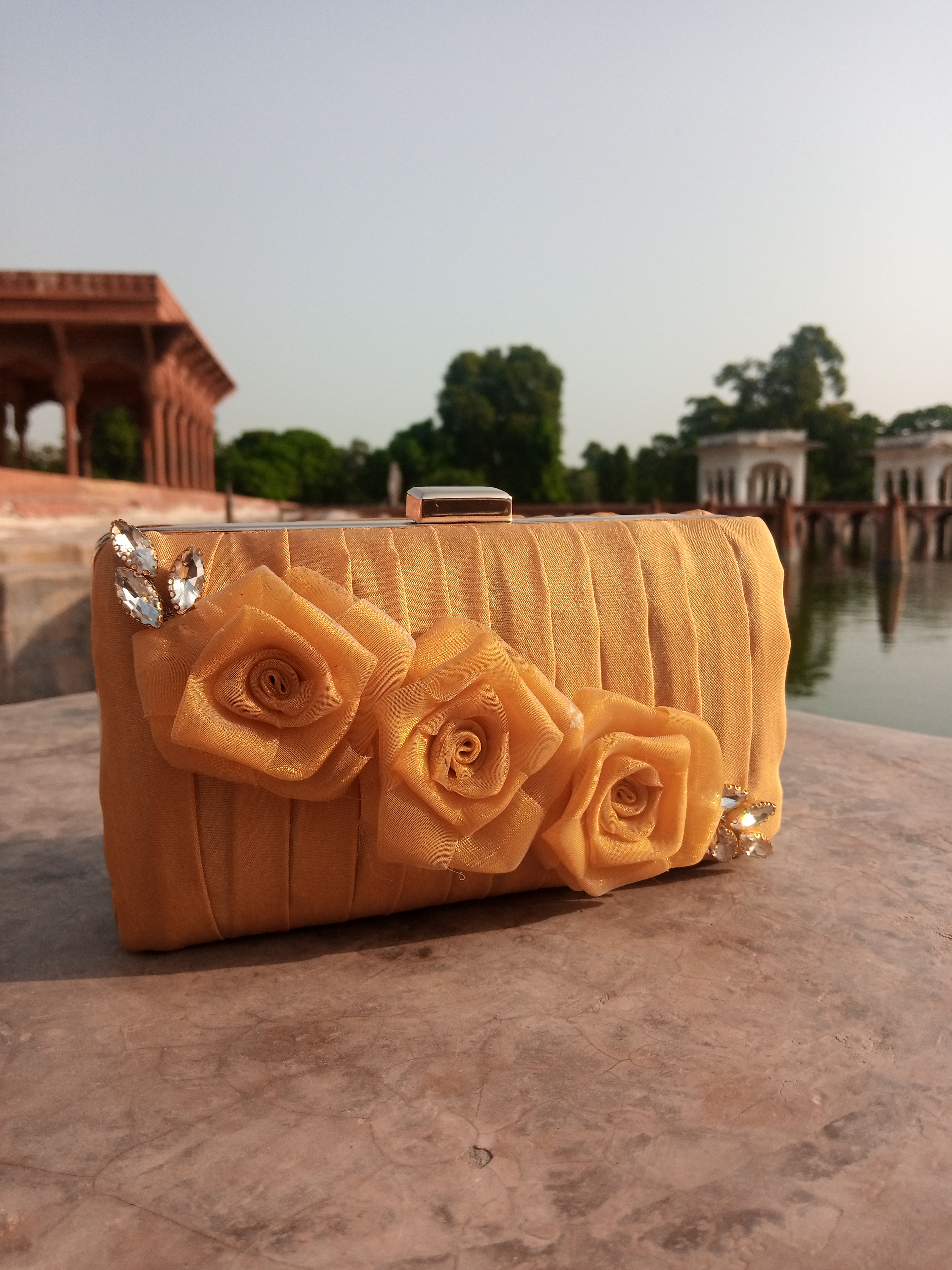 Ochre floral clutch 