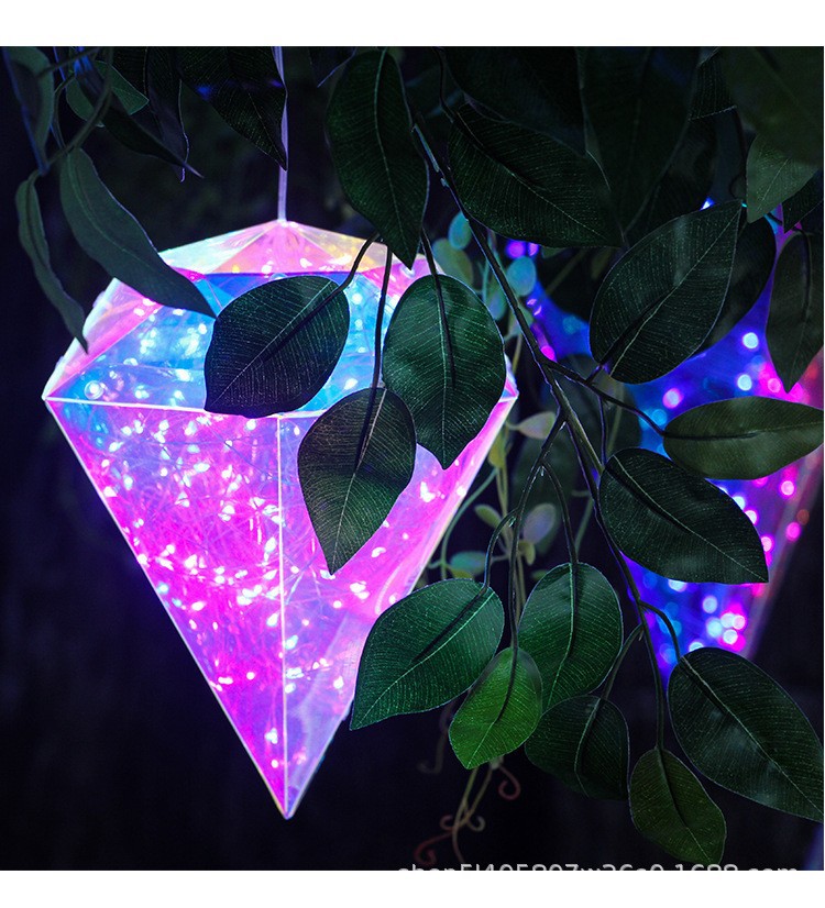 An Iridescent Hanging Diamond White LED Lights. Create A Visual Masterpiece In Your Home By Adding This Hanging Diamond To Your Festive Decor!