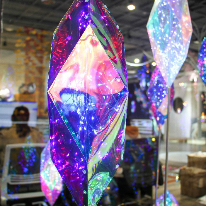An Iridescent Hanging Diamond White LED Lights. Create A Visual Masterpiece In Your Home By Adding This Hanging Diamond To Your Festive Decor!
