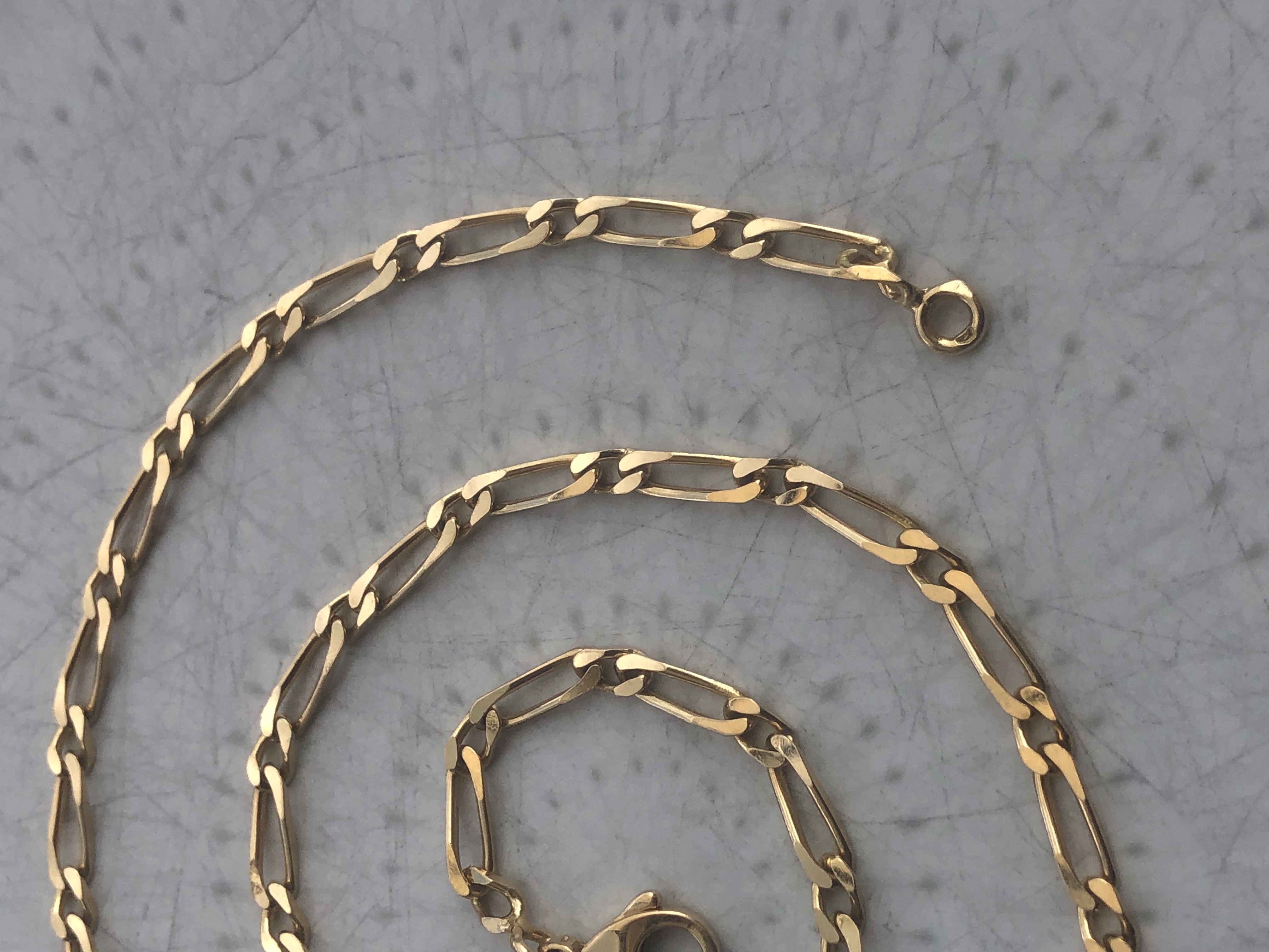 Chaine figaro en or 18 carats 