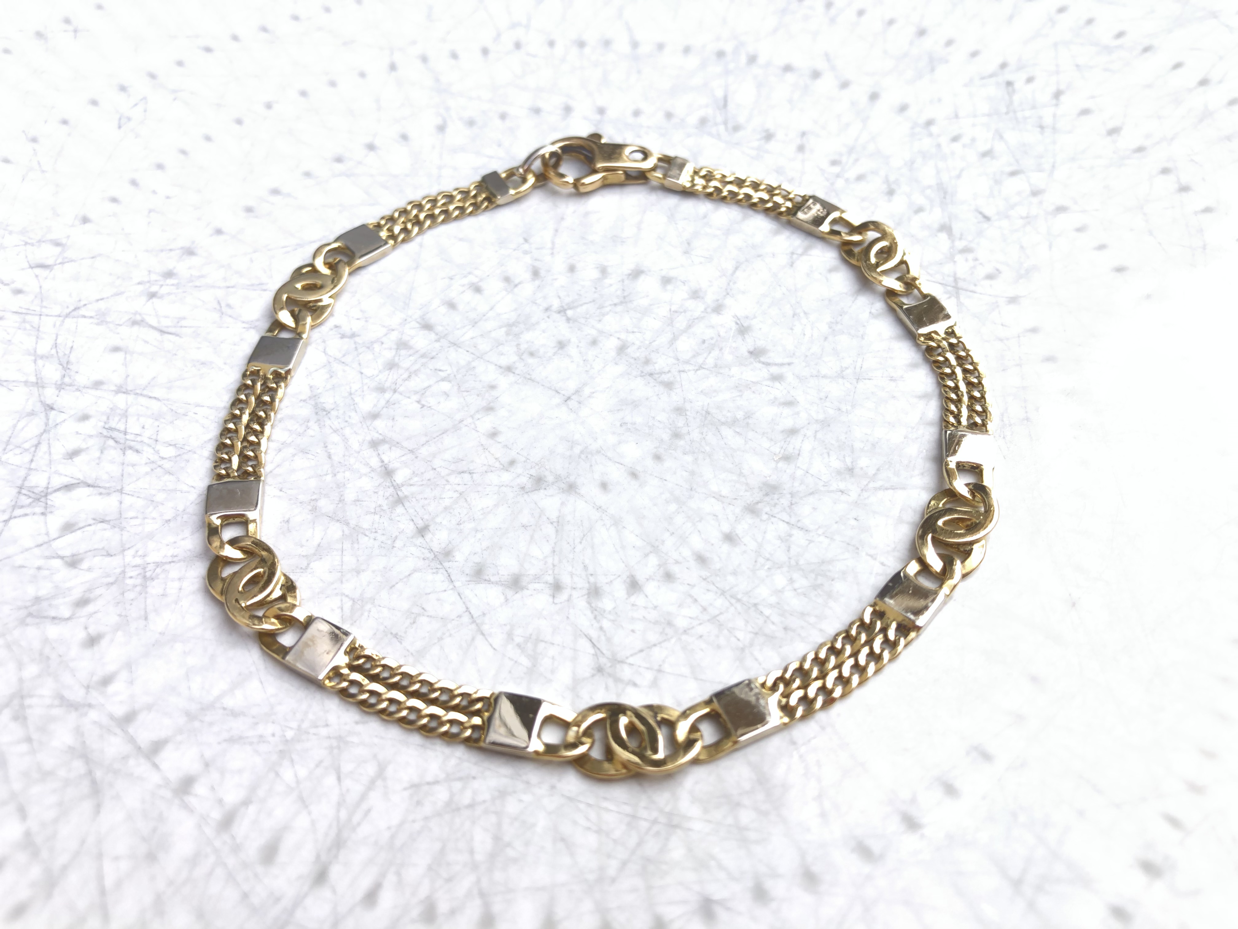 Bracelet en or jaune et blanc 18 carats