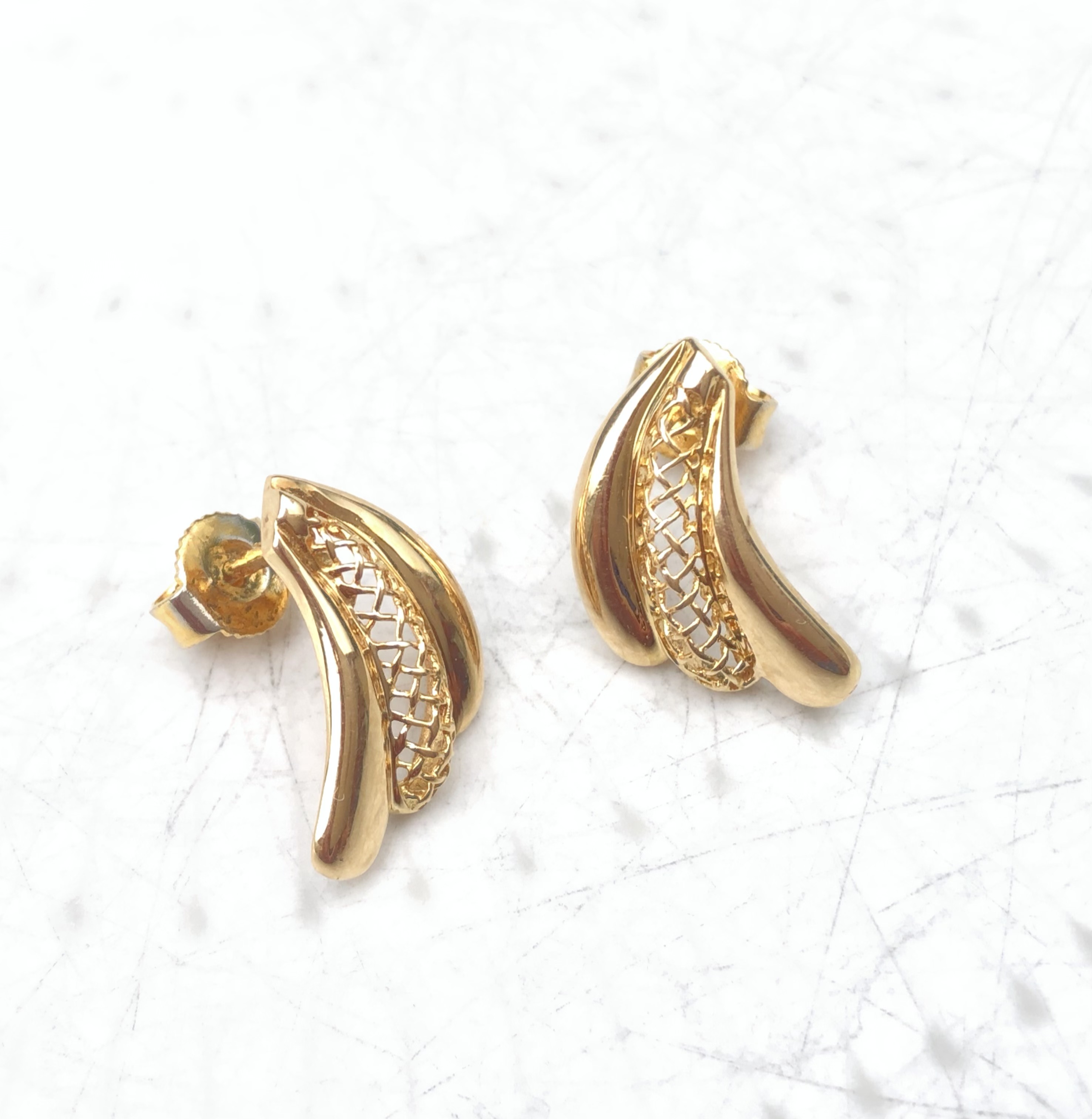 Puces d’oreilles en or jaune 18 carats