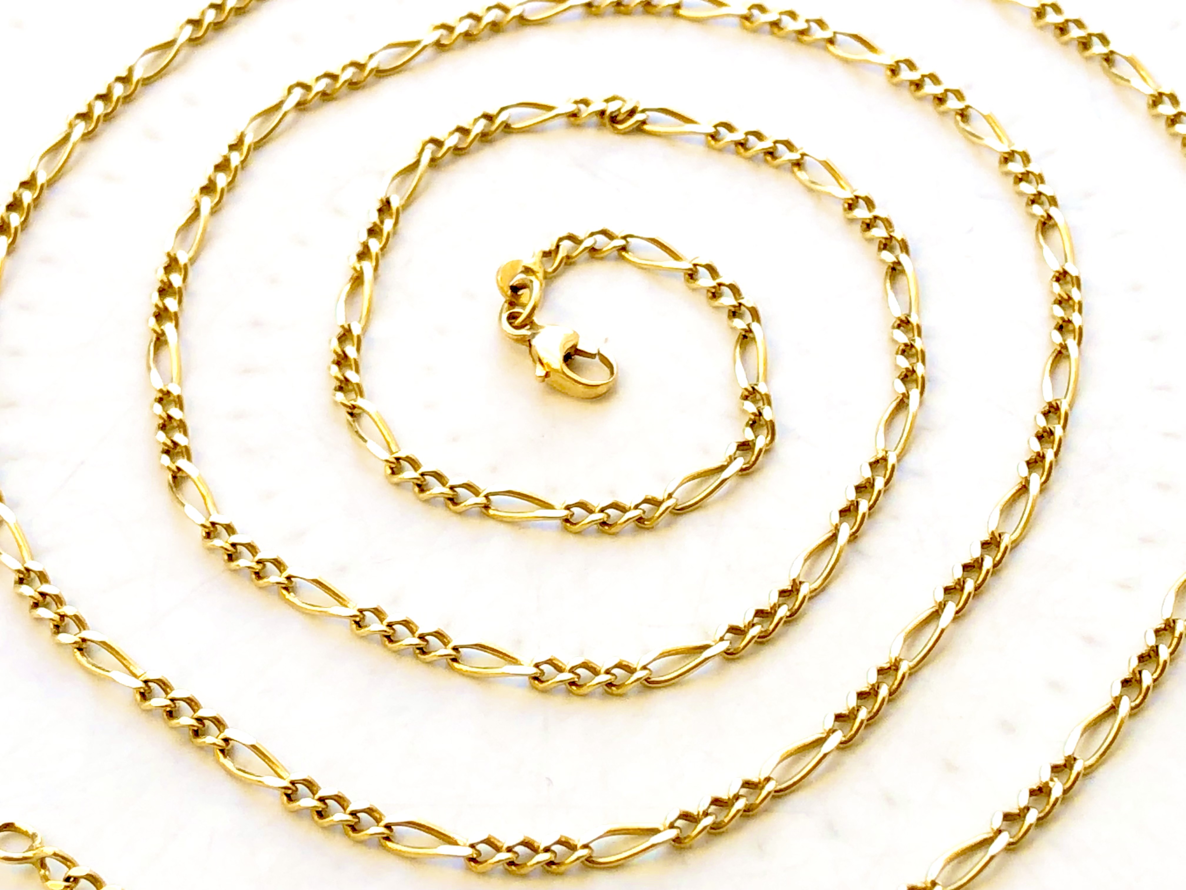 Chaine maille figaro 3/1 en or jaune 18 carats 