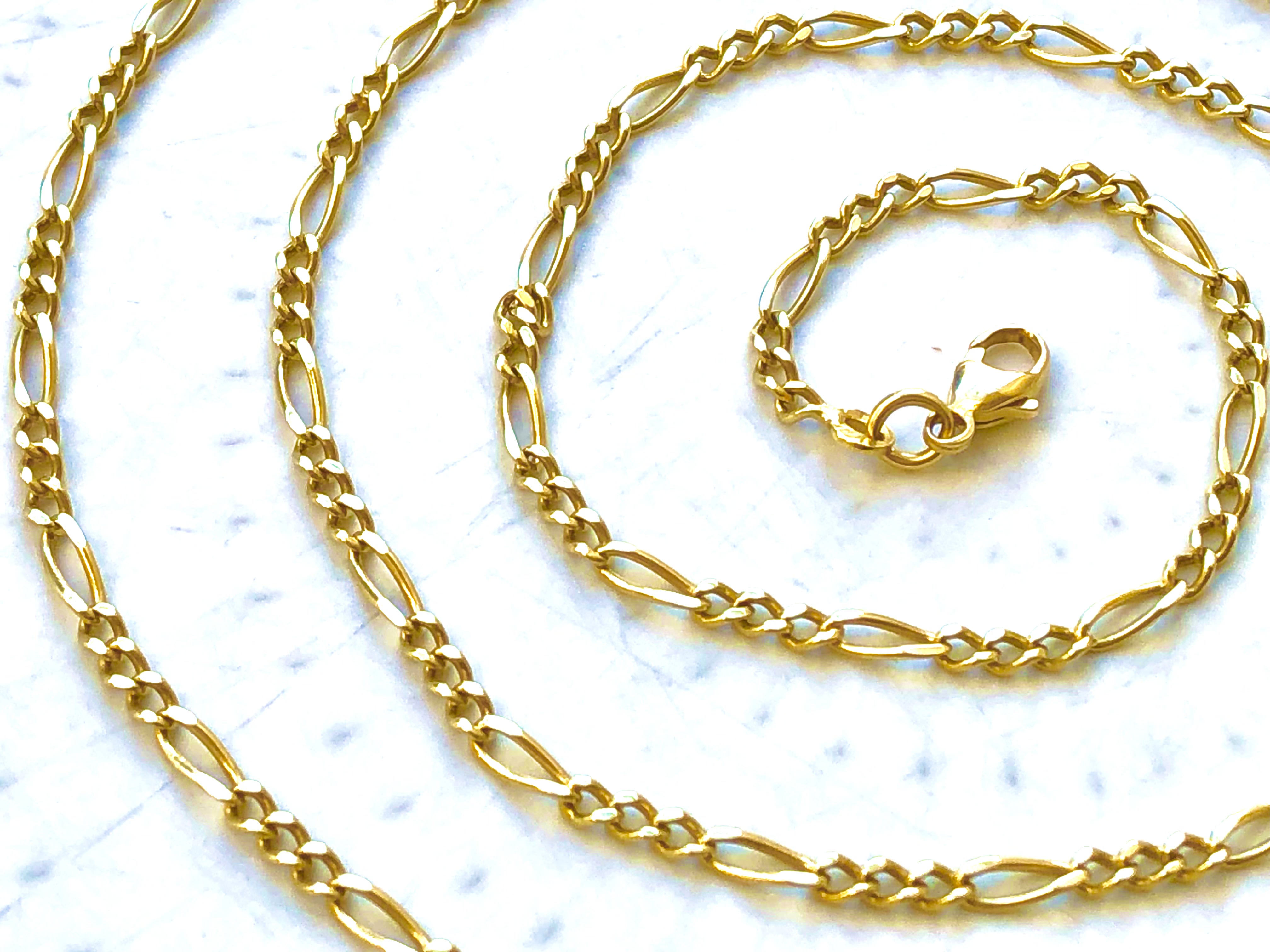 Chaine maille figaro 3/1 en or jaune 18 carats 