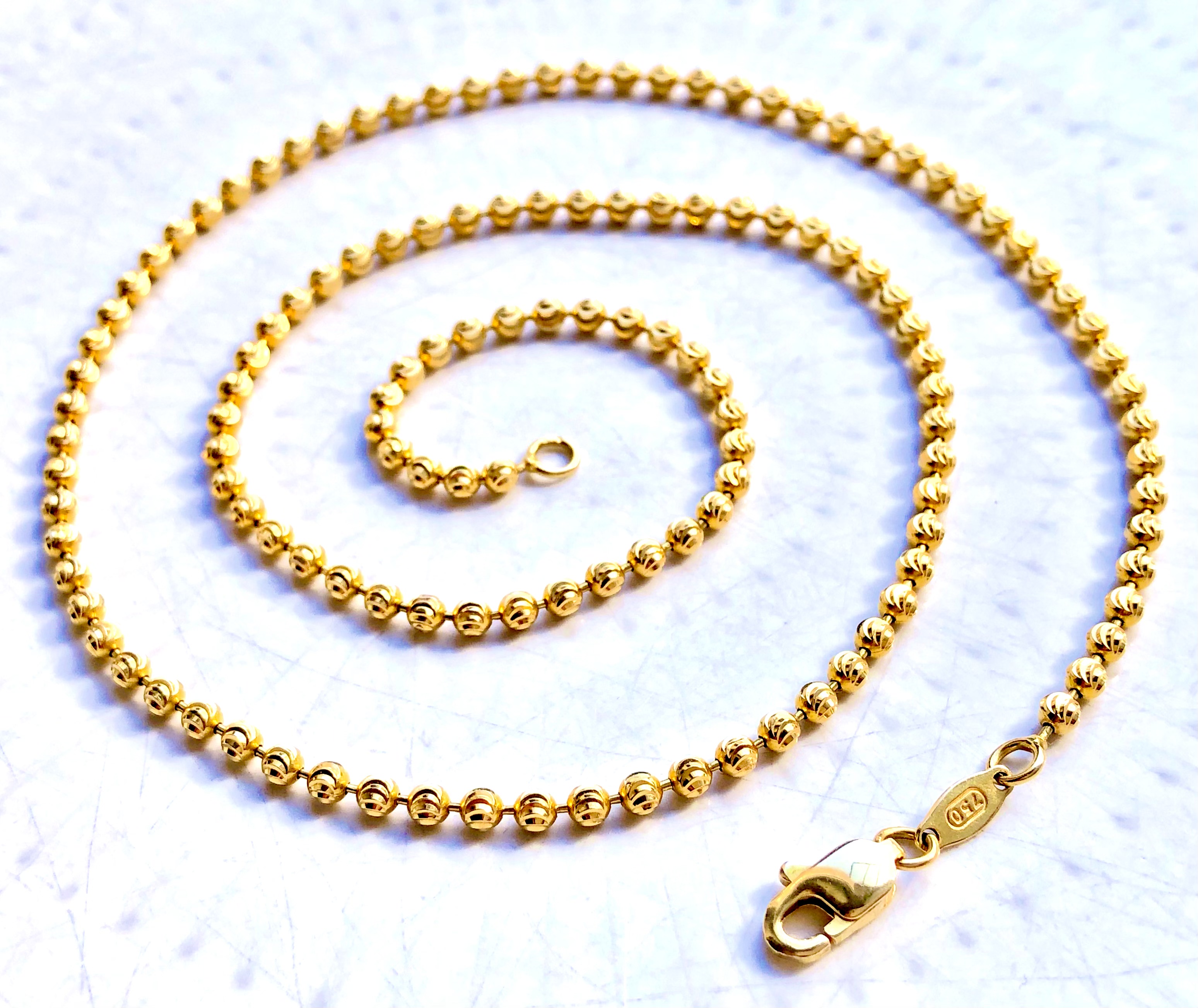 Collier boules en or 18 carats 