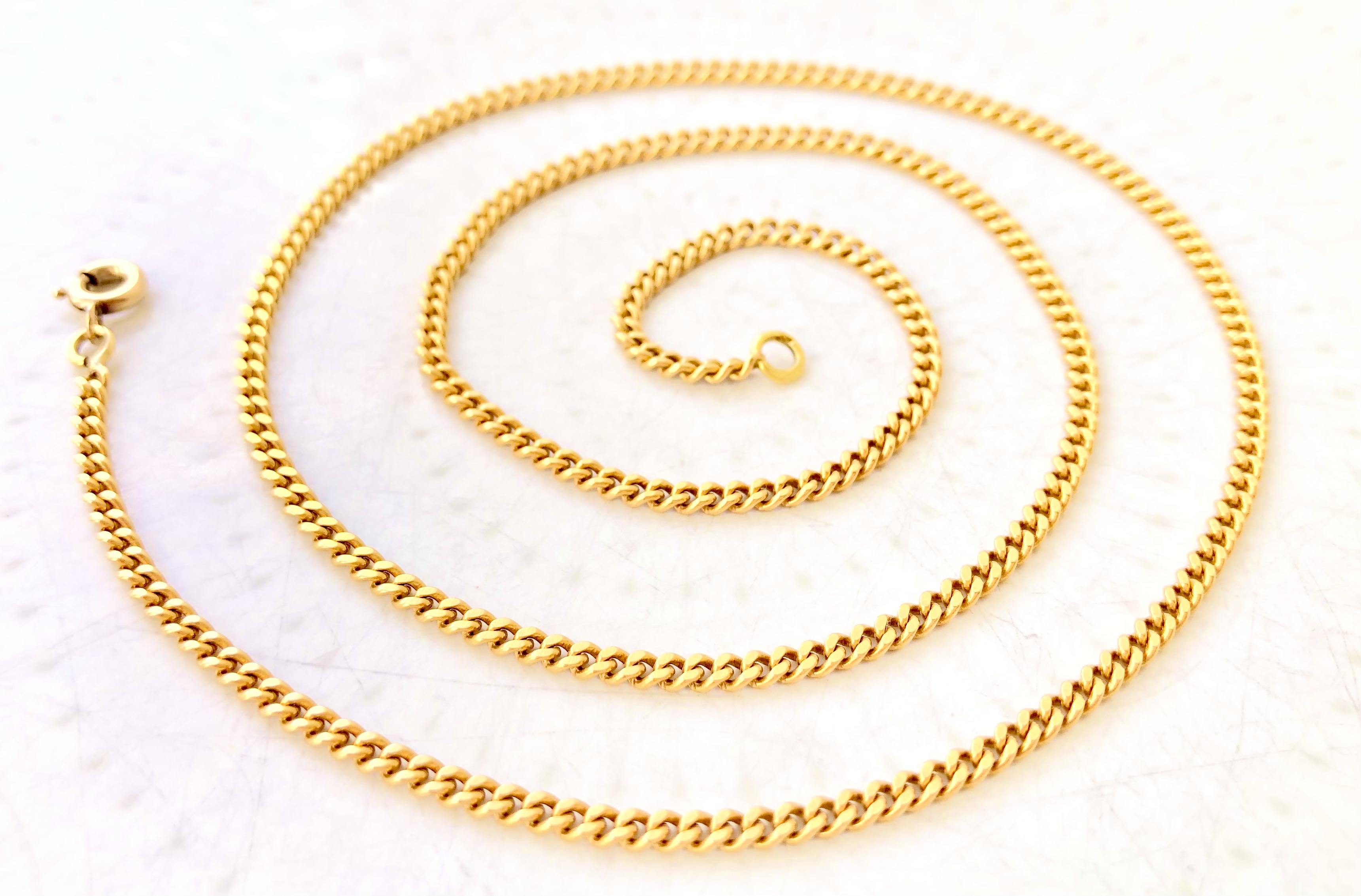 Chaine maille gourmette en Or jaune 18 carats