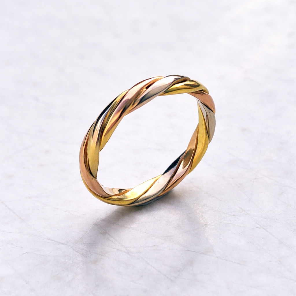 Bague entrelacé 3 ors 18 carats 