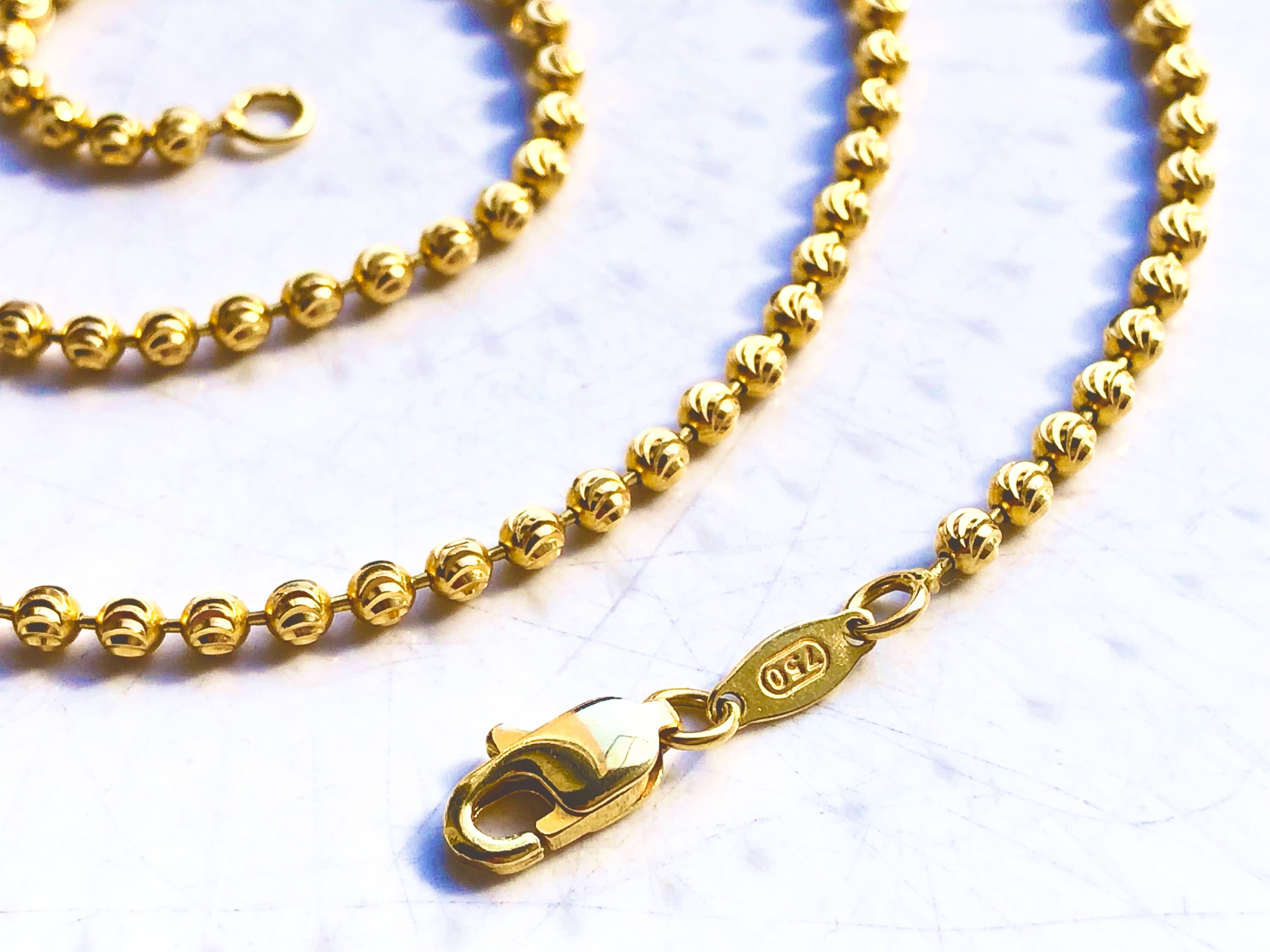 Collier boules en or 18 carats 