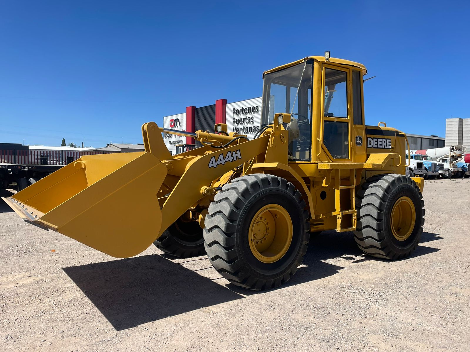 #1487-1 Cargador frontal John Deere 444H 1999