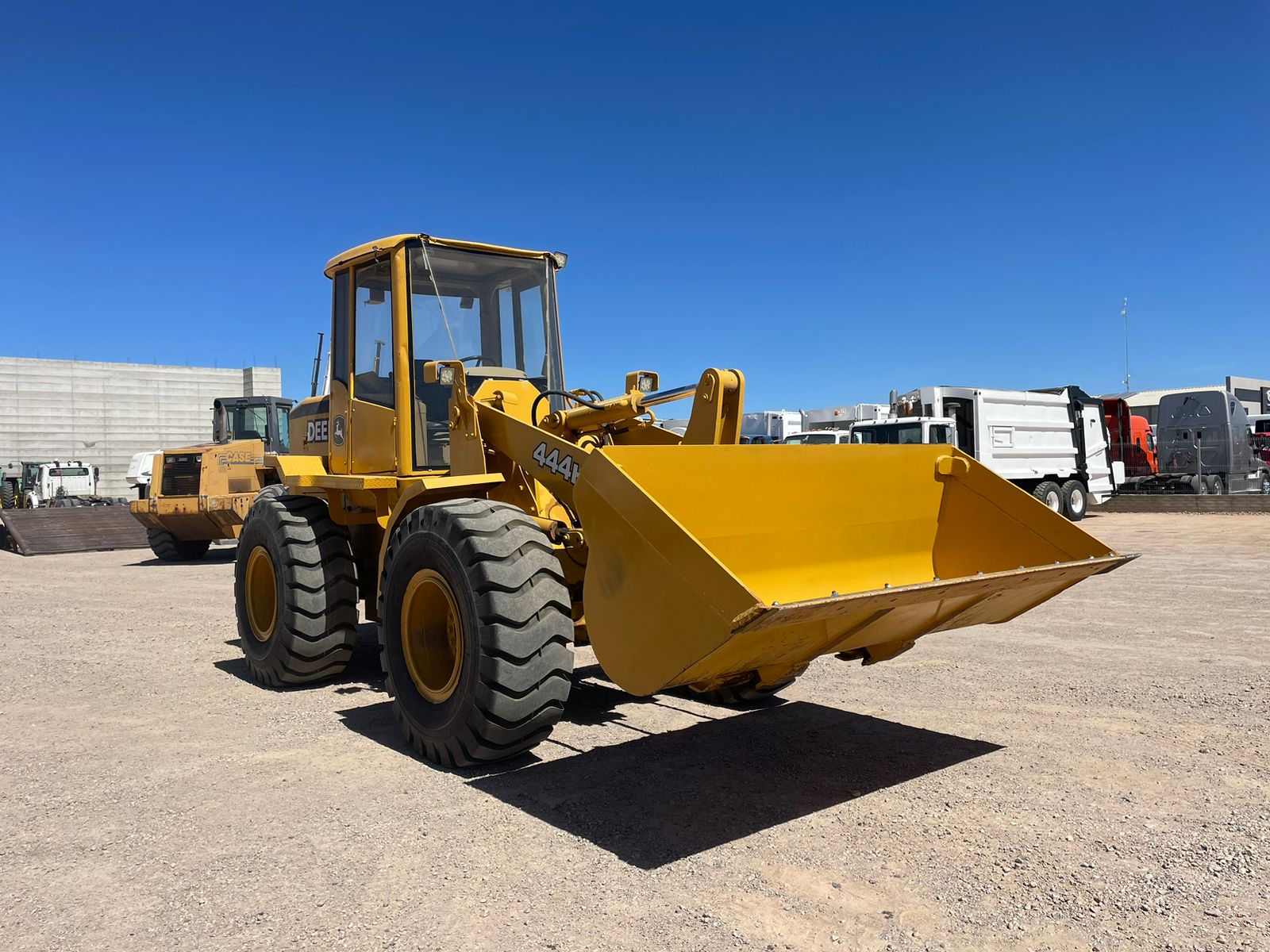 #1487-1 Cargador frontal John Deere 444H 1999