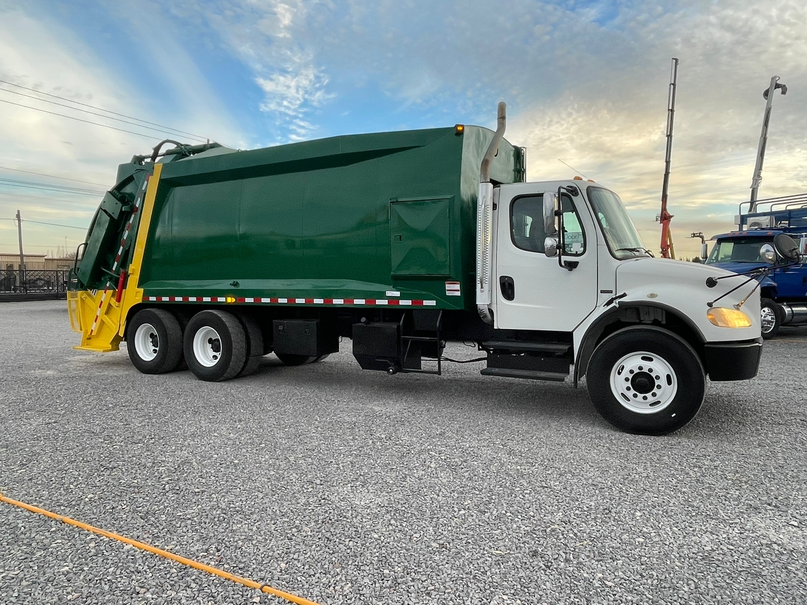 #1406 Camion de basura Freightliner 2005 42,000lb