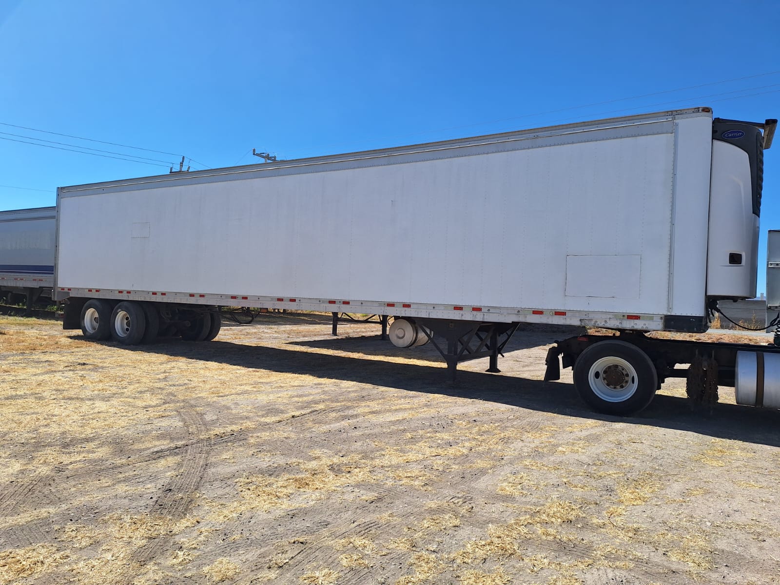 #916 Caja refrigerada 48' Marca Great Danes 2004 Unidad Marca Carrier Suspensión de Aire Puerta de Cortina