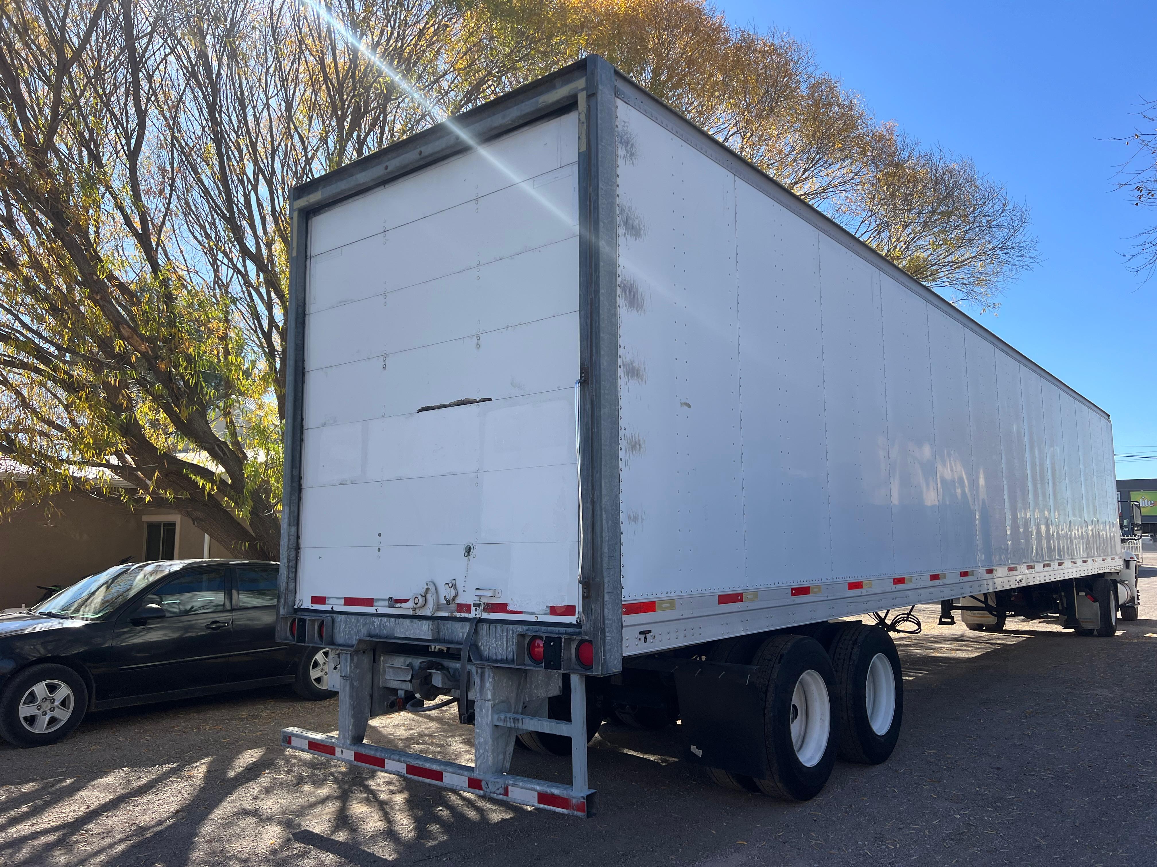 #2754 Caja Seca 2006 53' Marca Mond Industries Suspensión de Aire Puerta de Cortina