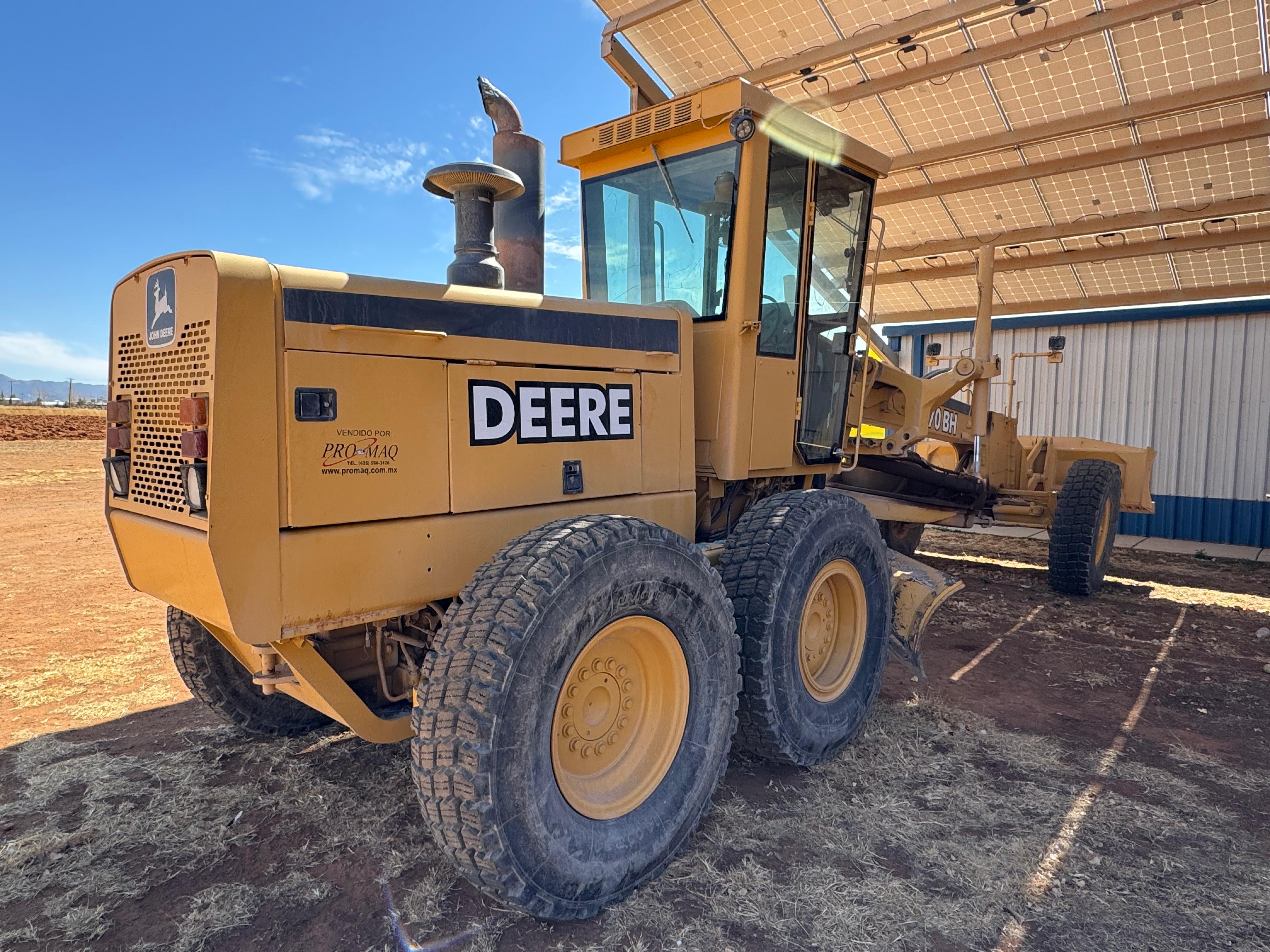 #1034 Niveladora John Deere