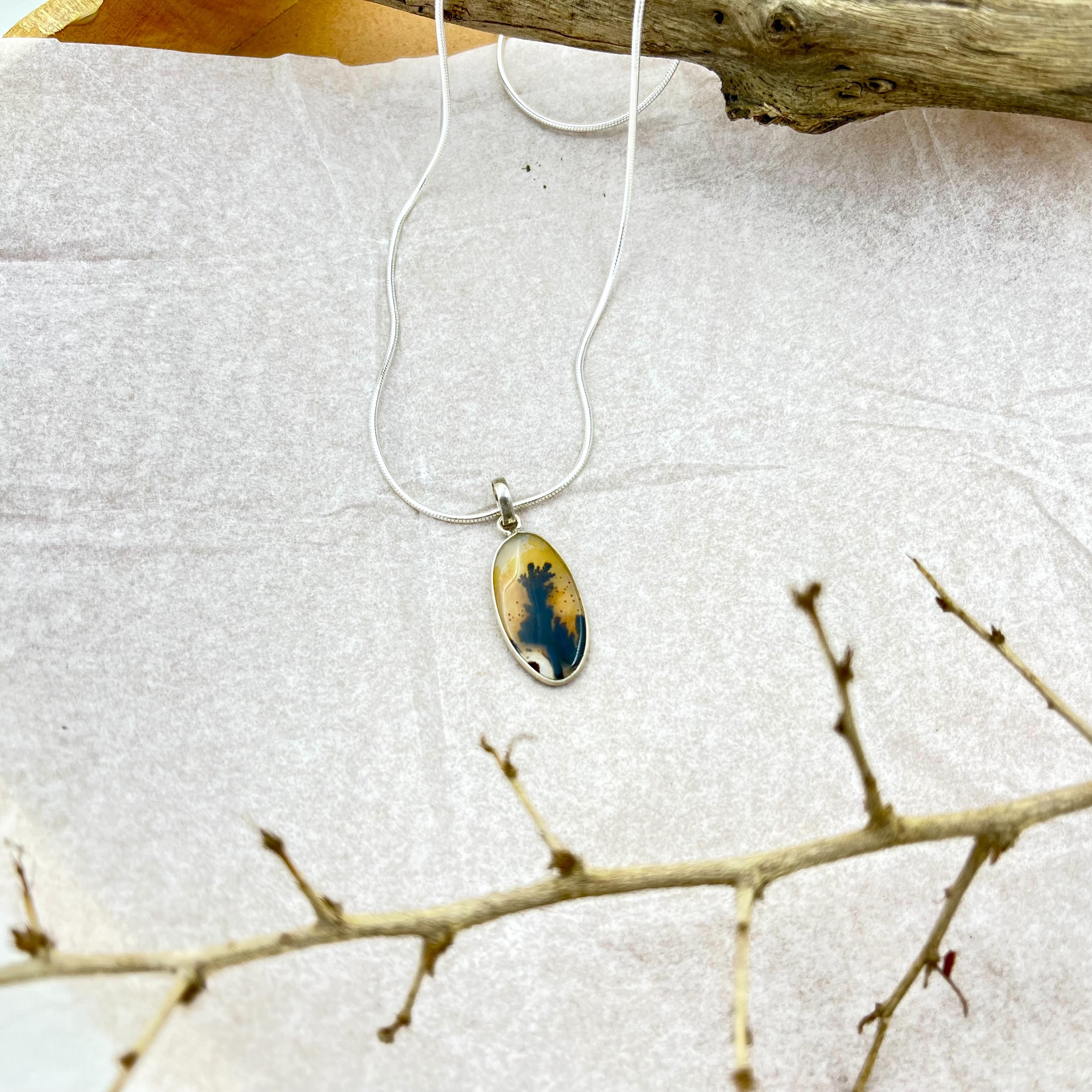 Shadowroot Shazar silver pendant