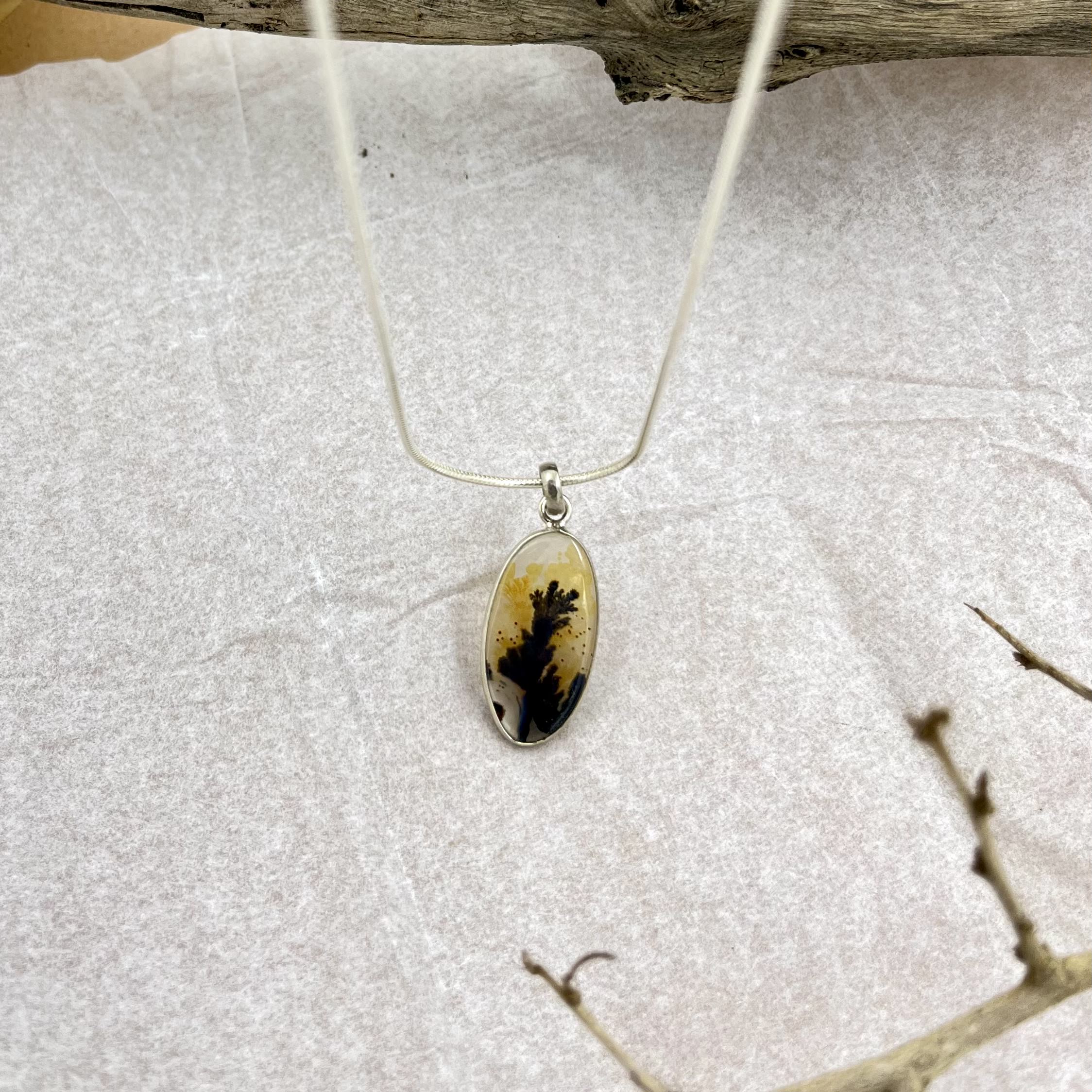 Shadowroot Shazar silver pendant