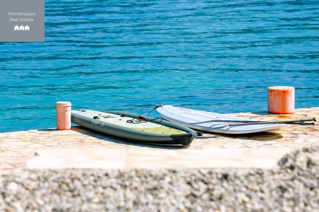 Seafront villa with private beach and two pools in Krtole (Tivat)