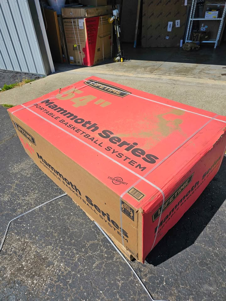 Lifetime 54-Inch Tempered Glass Portable Basketball Hoop with Mammoth Lift Adjustment & Ultra Rim