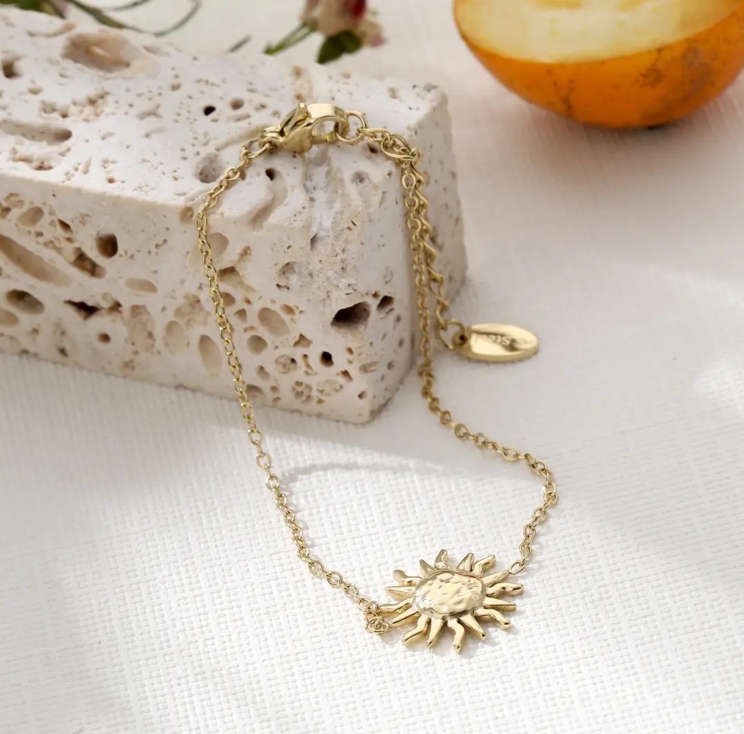 Bracelet en acier inoxydable avec pendentif soleil
