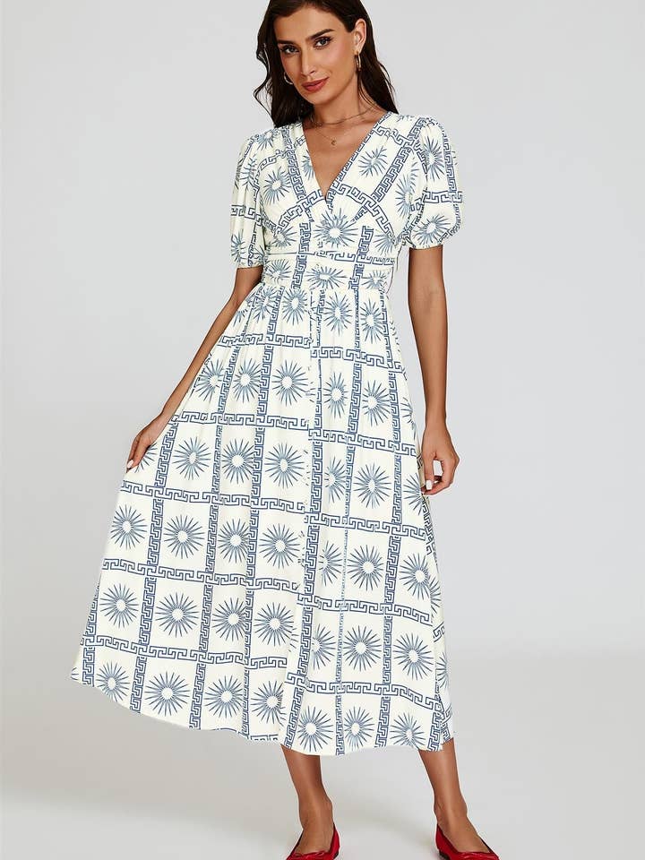 Robe mi-longue à imprimé géo avec encolure en V en blanc