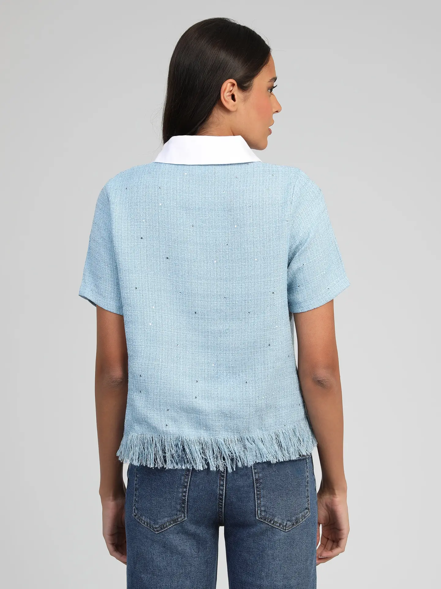 Le polo ciel en tweed