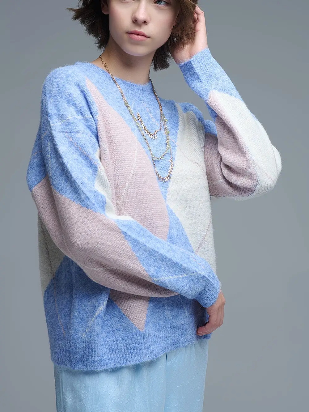 Pull tricolore et losange 