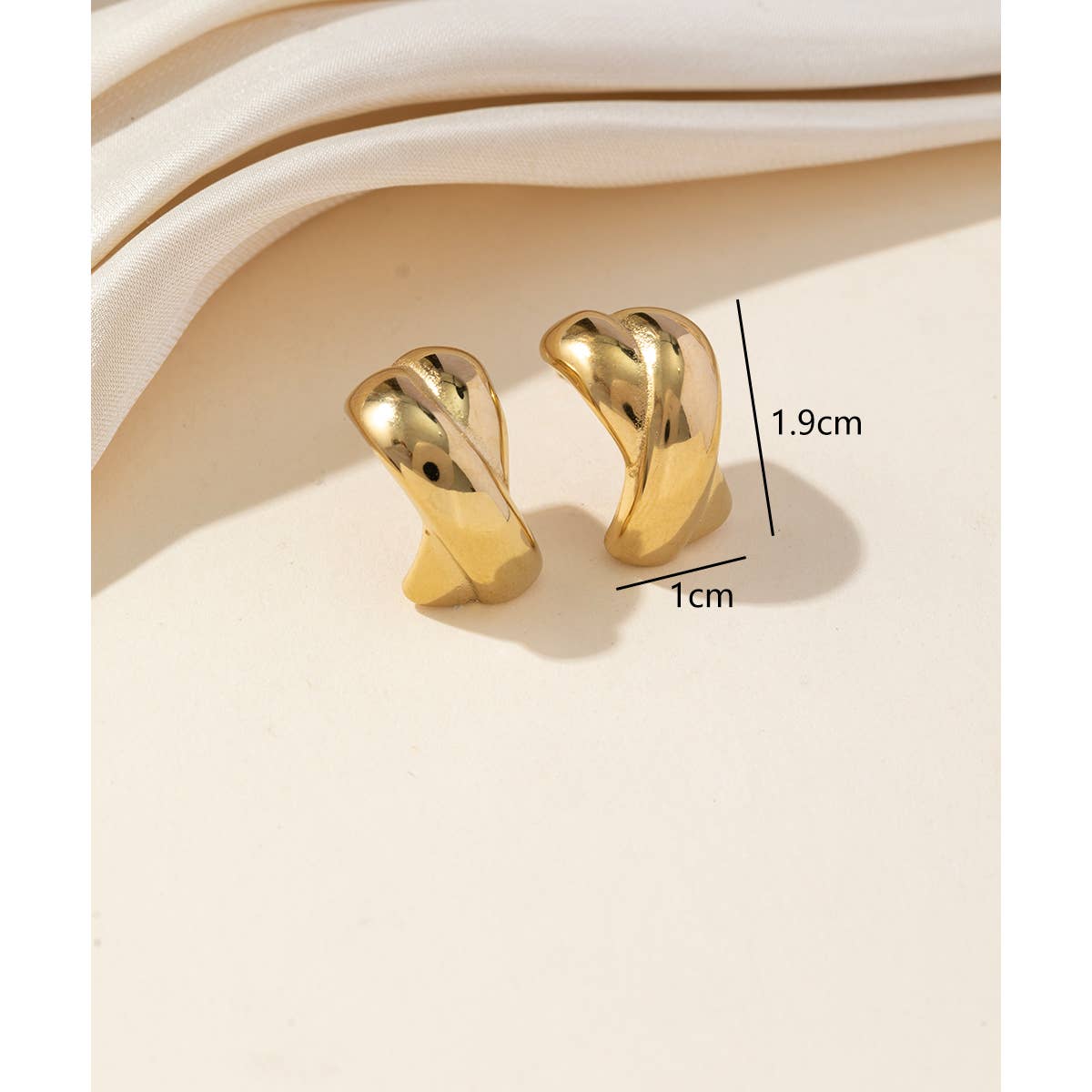 Les bijoux oreilles en X