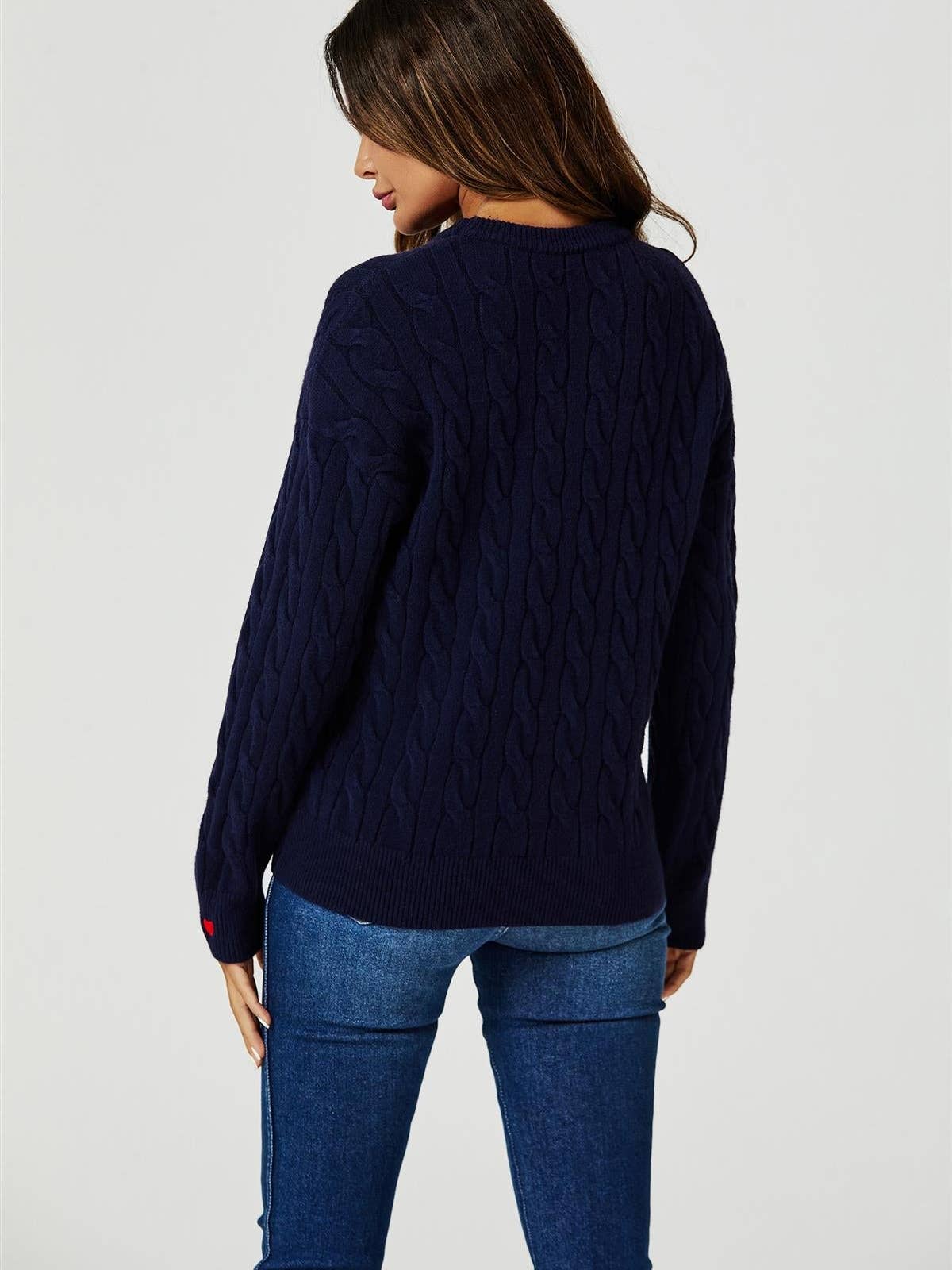 Le pull en maille coton avec broderie cœur