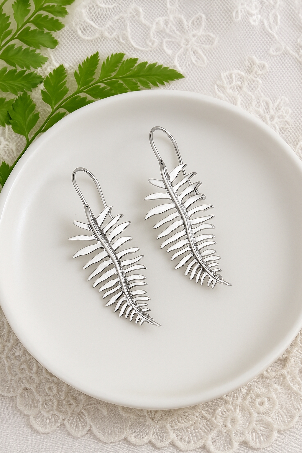 Les pendants oreilles feuille de fougère